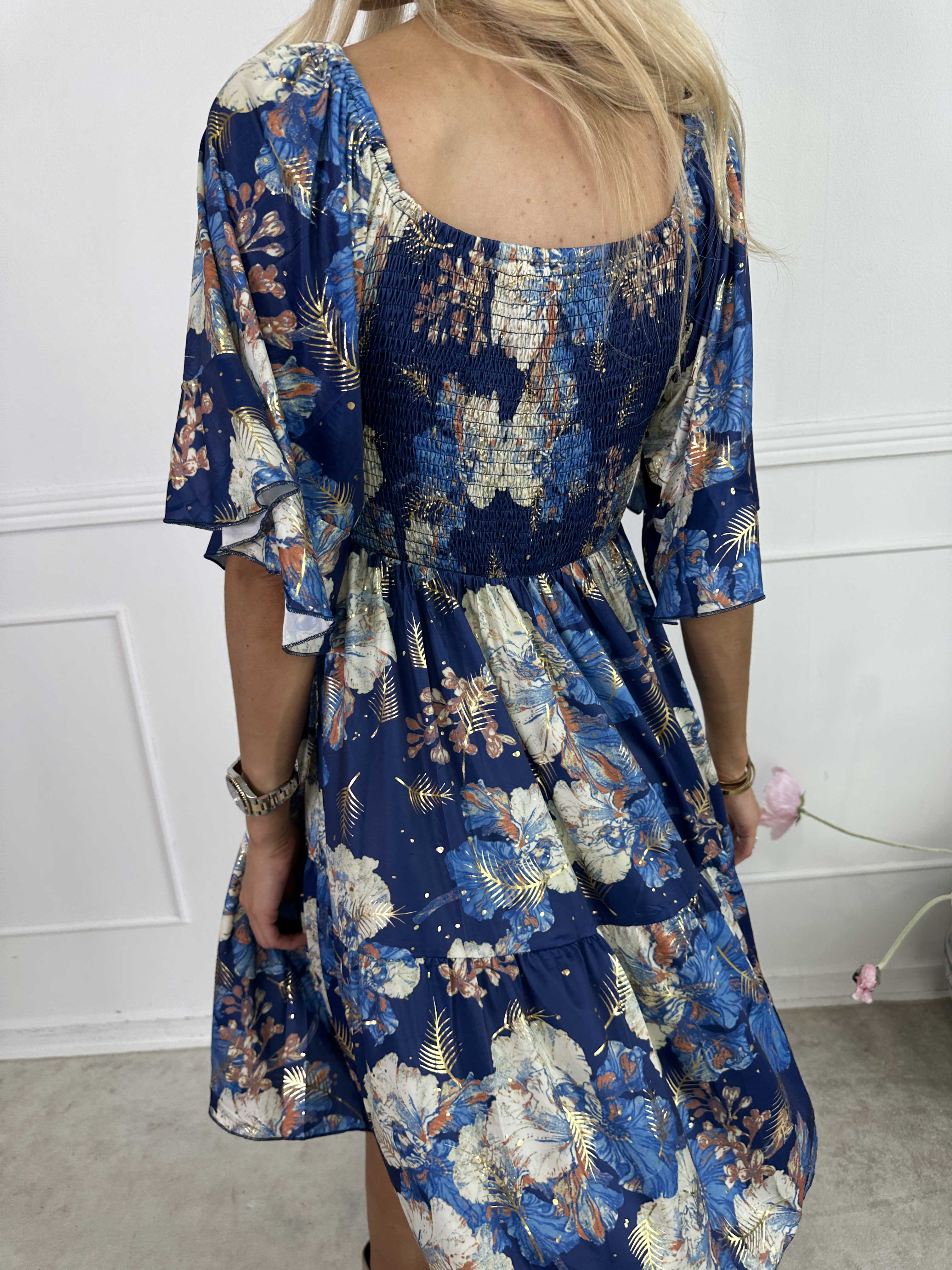 Elna Beautiful Short - Blommig elastisk klänning med smock över bysten