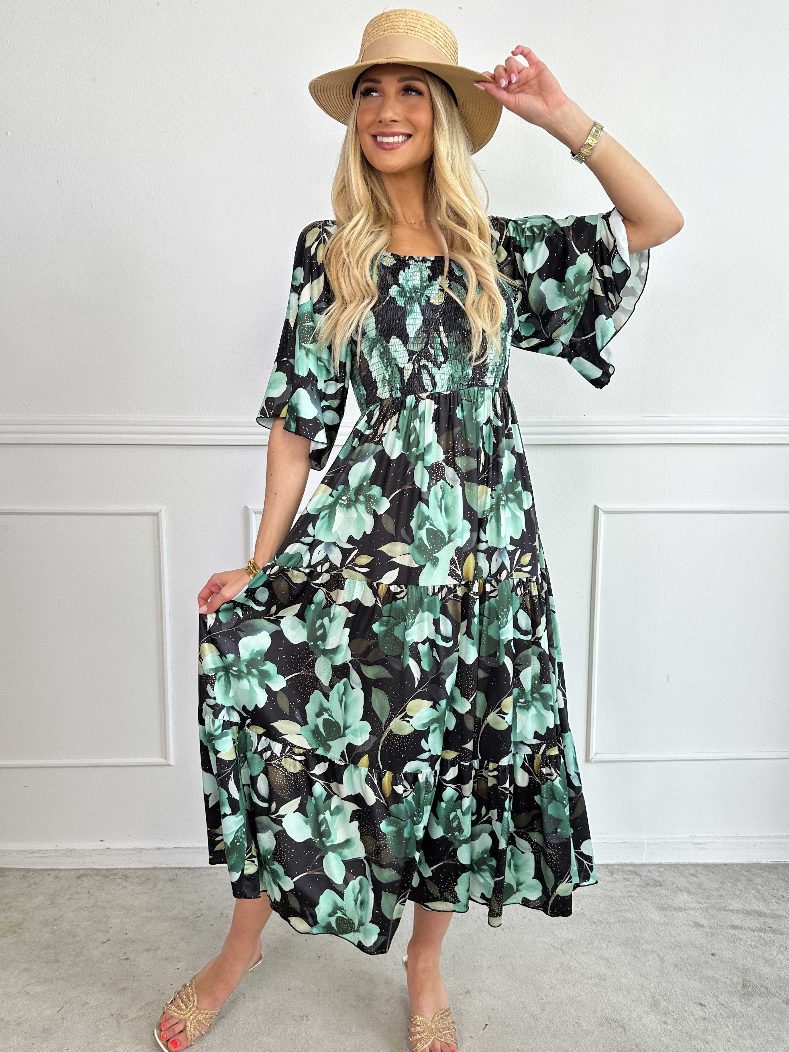 Elna Fiore - Blommig elastisk klänning med smock över bysten