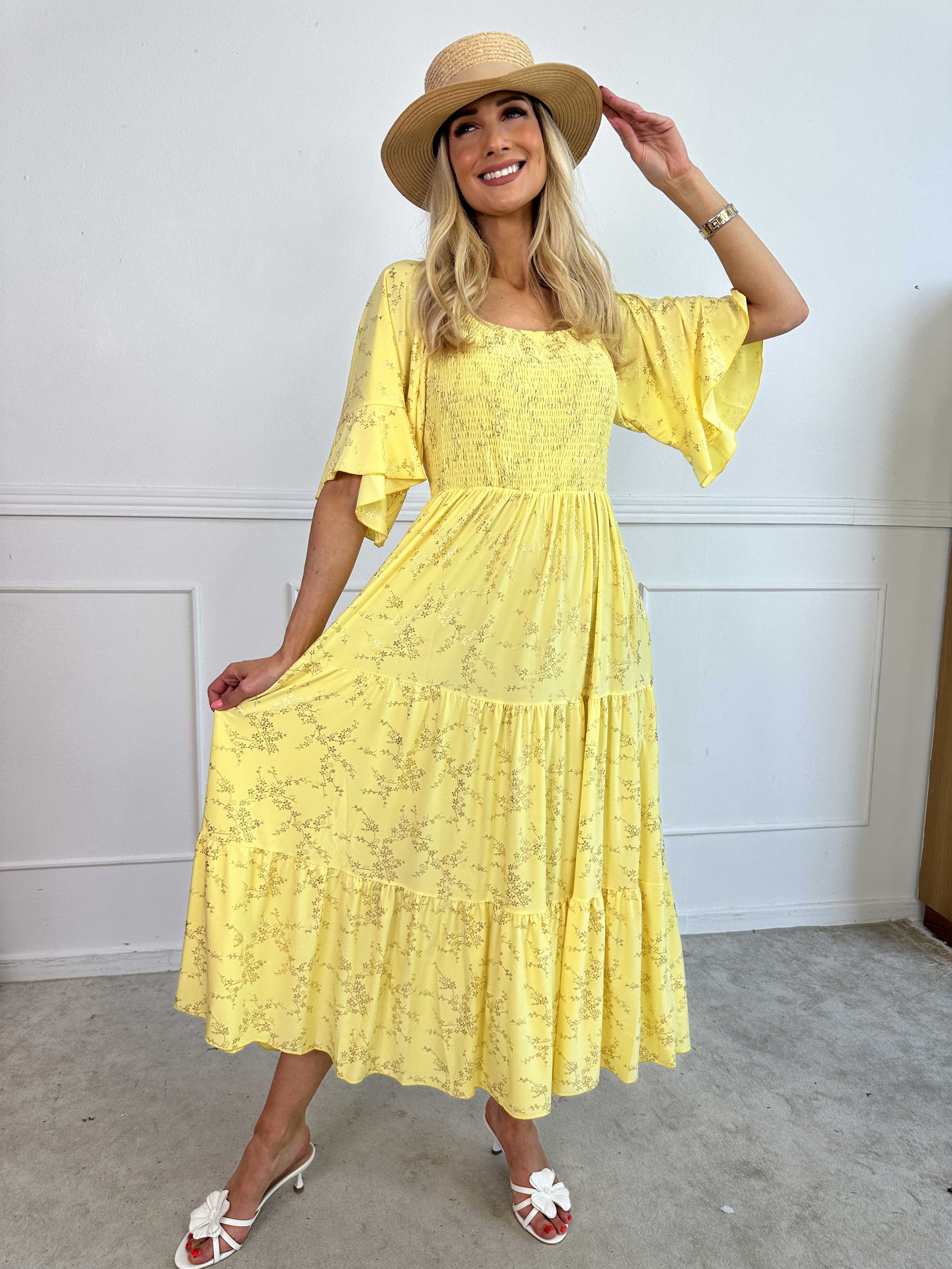 Elna Gold - Enfärgad elastisk klänning med resår och guldmönster