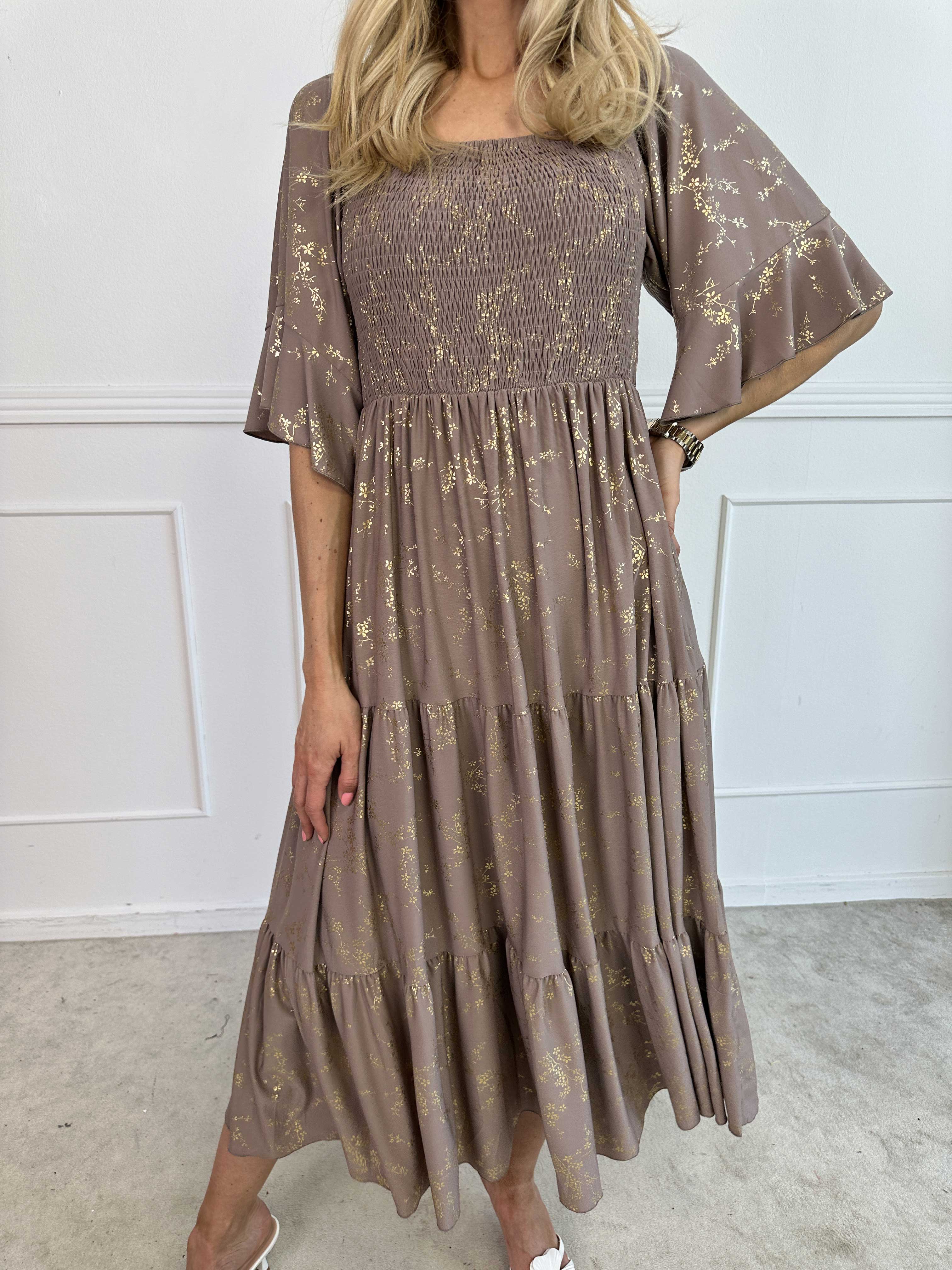 Elna Gold - Enfärgad elastisk klänning med resår och guldmönster