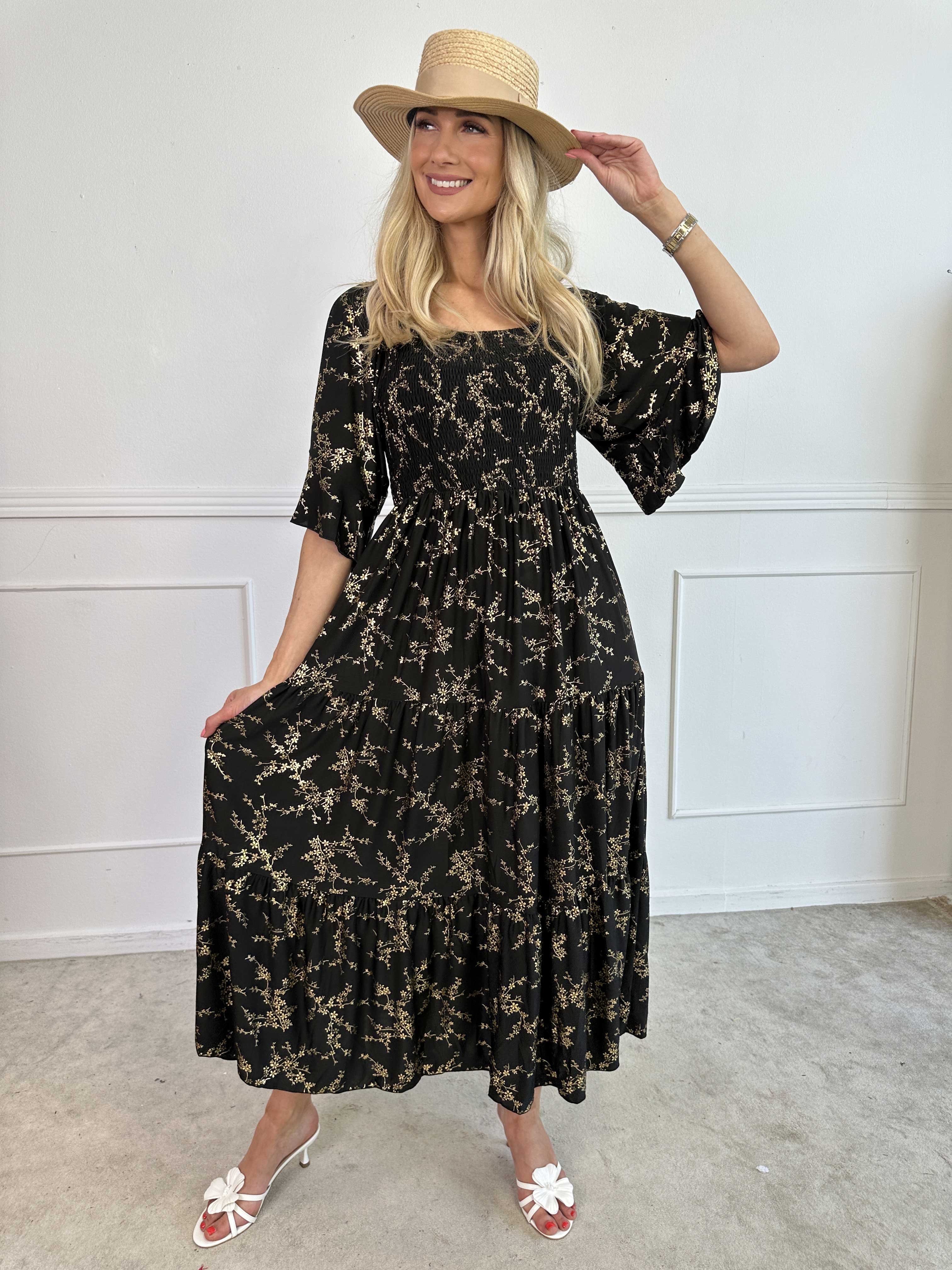 Elna Gold - Enfärgad elastisk klänning med resår och guldmönster