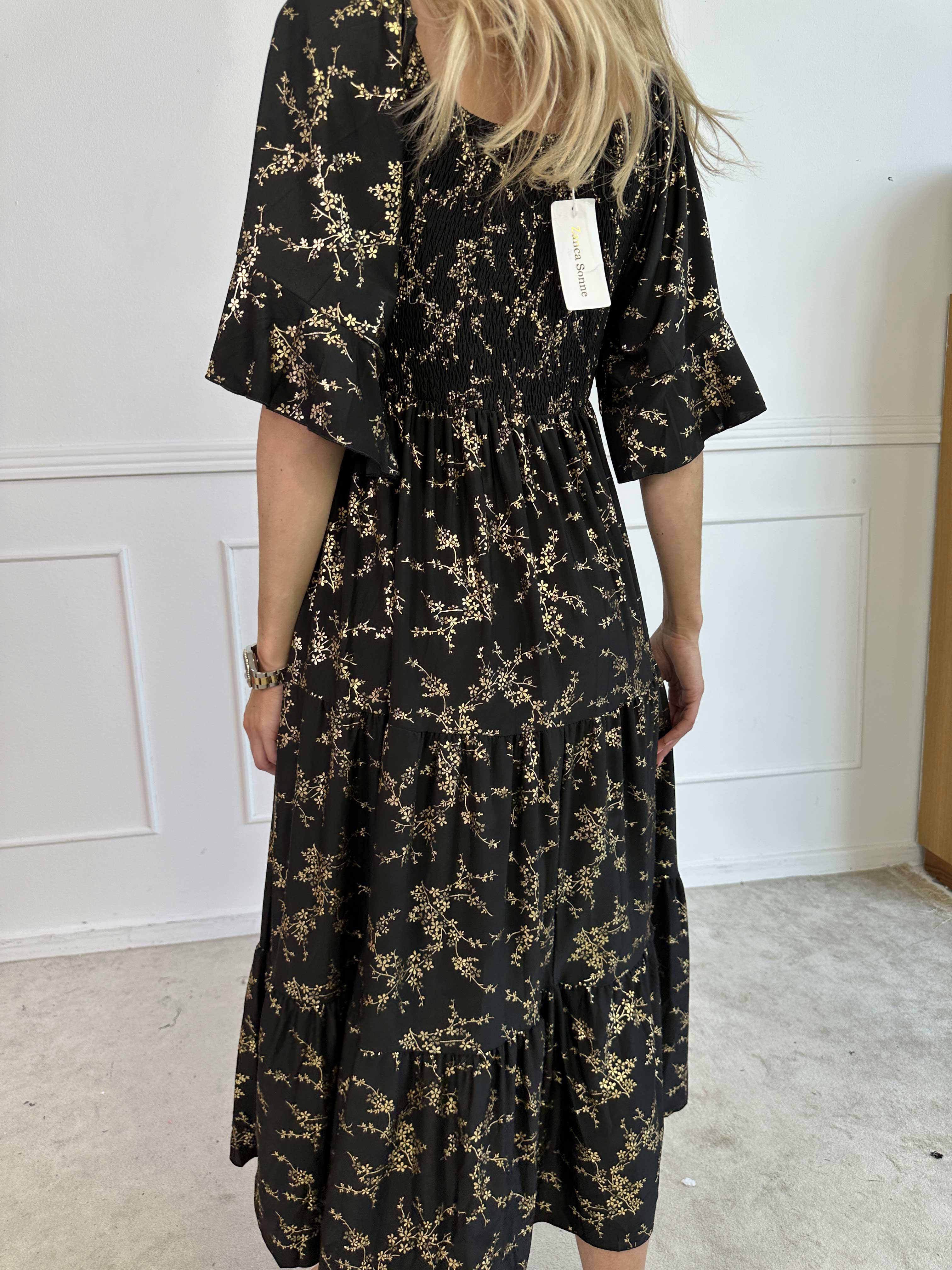 Elna Gold - Enfärgad elastisk klänning med resår och guldmönster