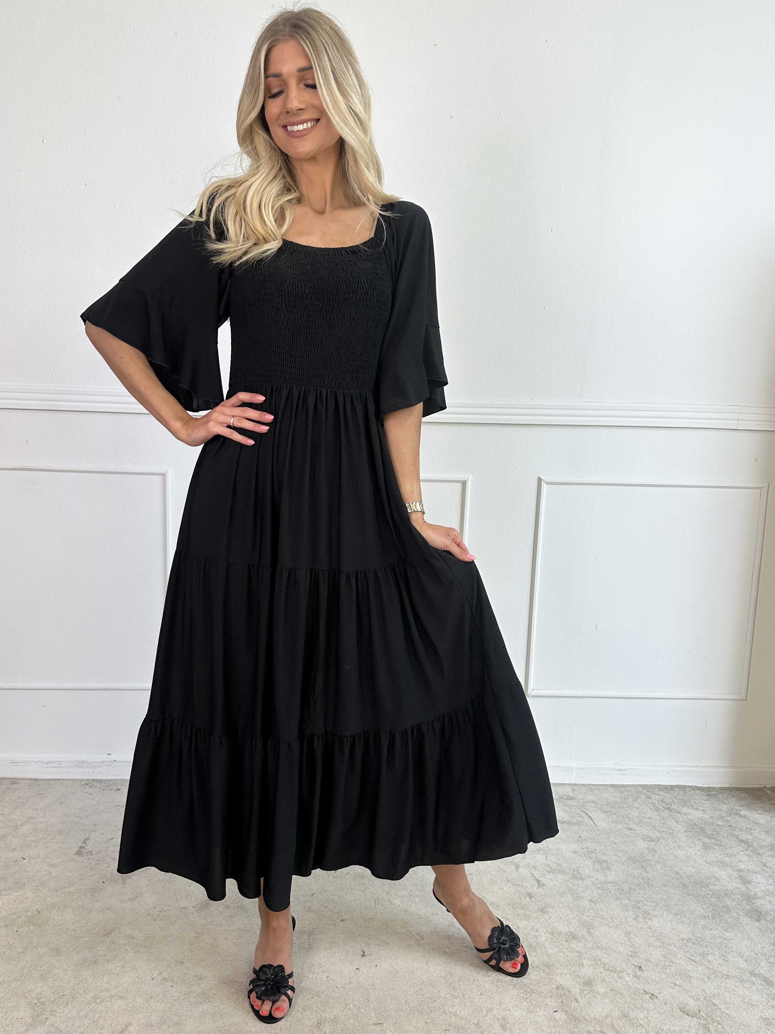 Elna Plain - Lång elastisk plain klänning med resår över bysten