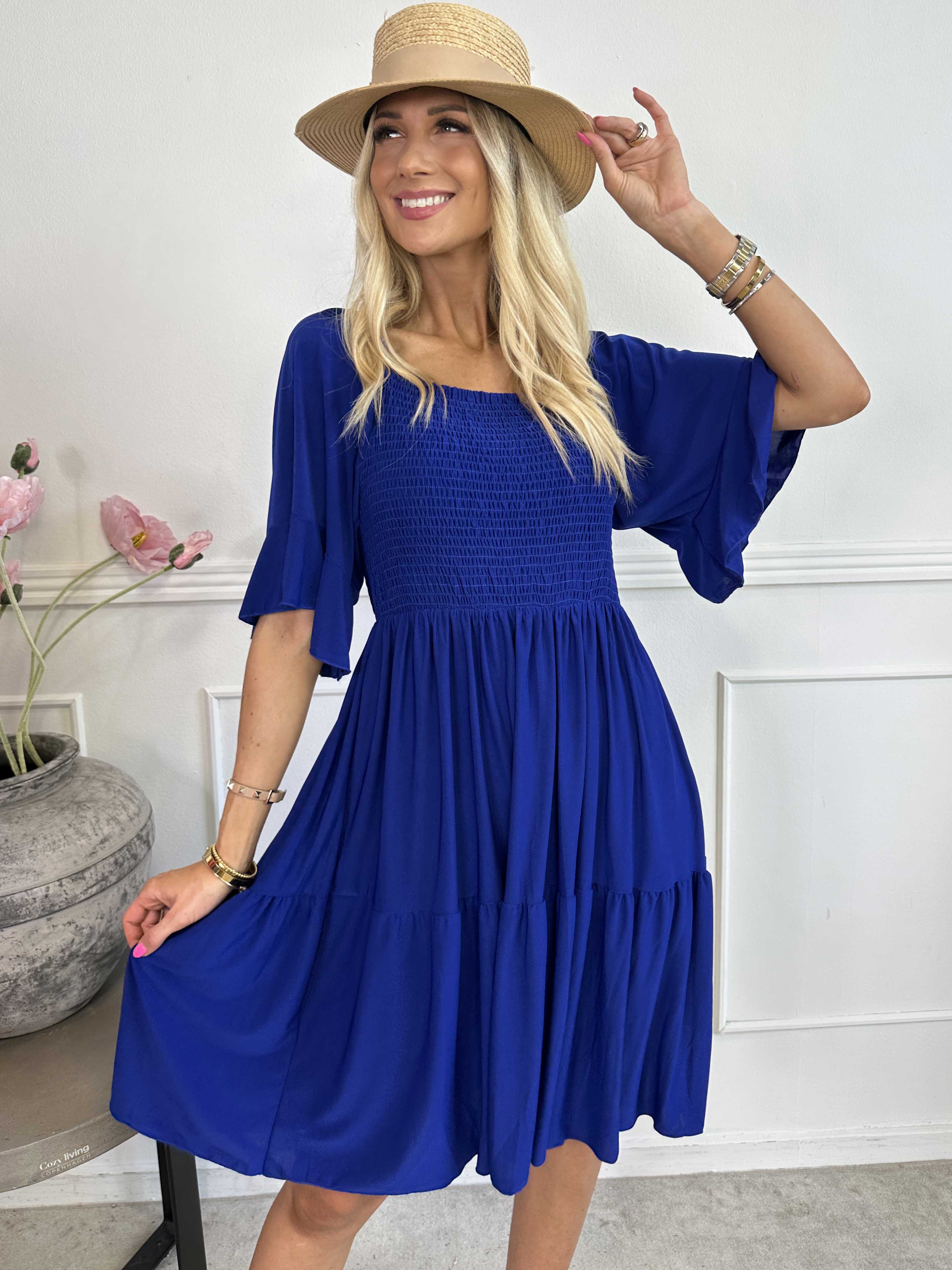 Elna Plain Short - Elastisk plain klänning med resår över bysten