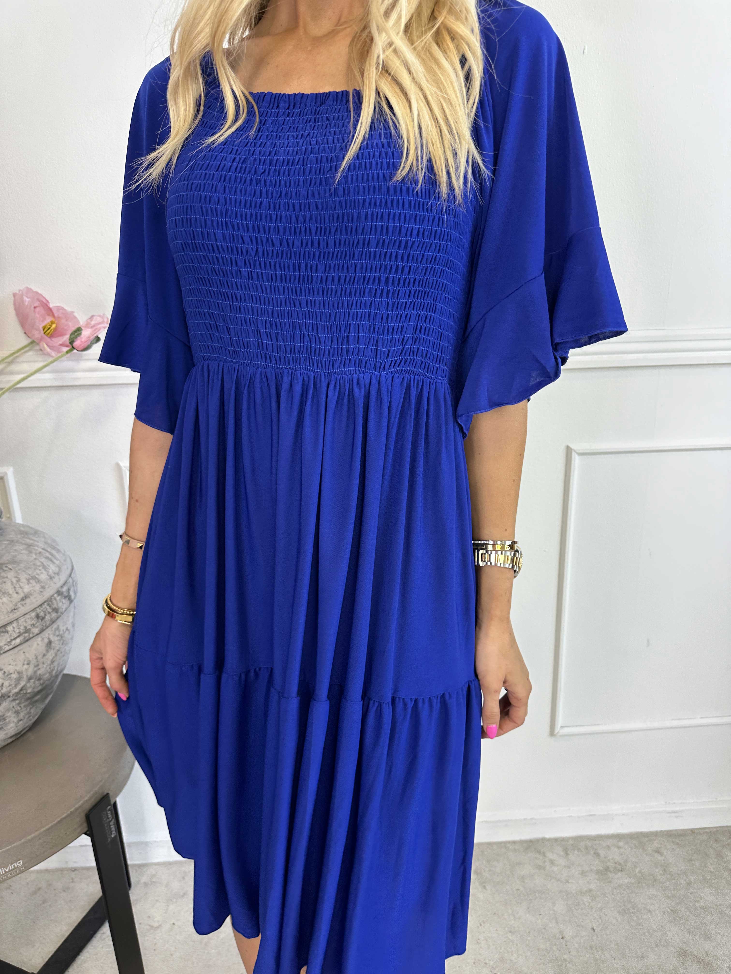 Elna Plain Short - Elastisk plain klänning med resår över bysten