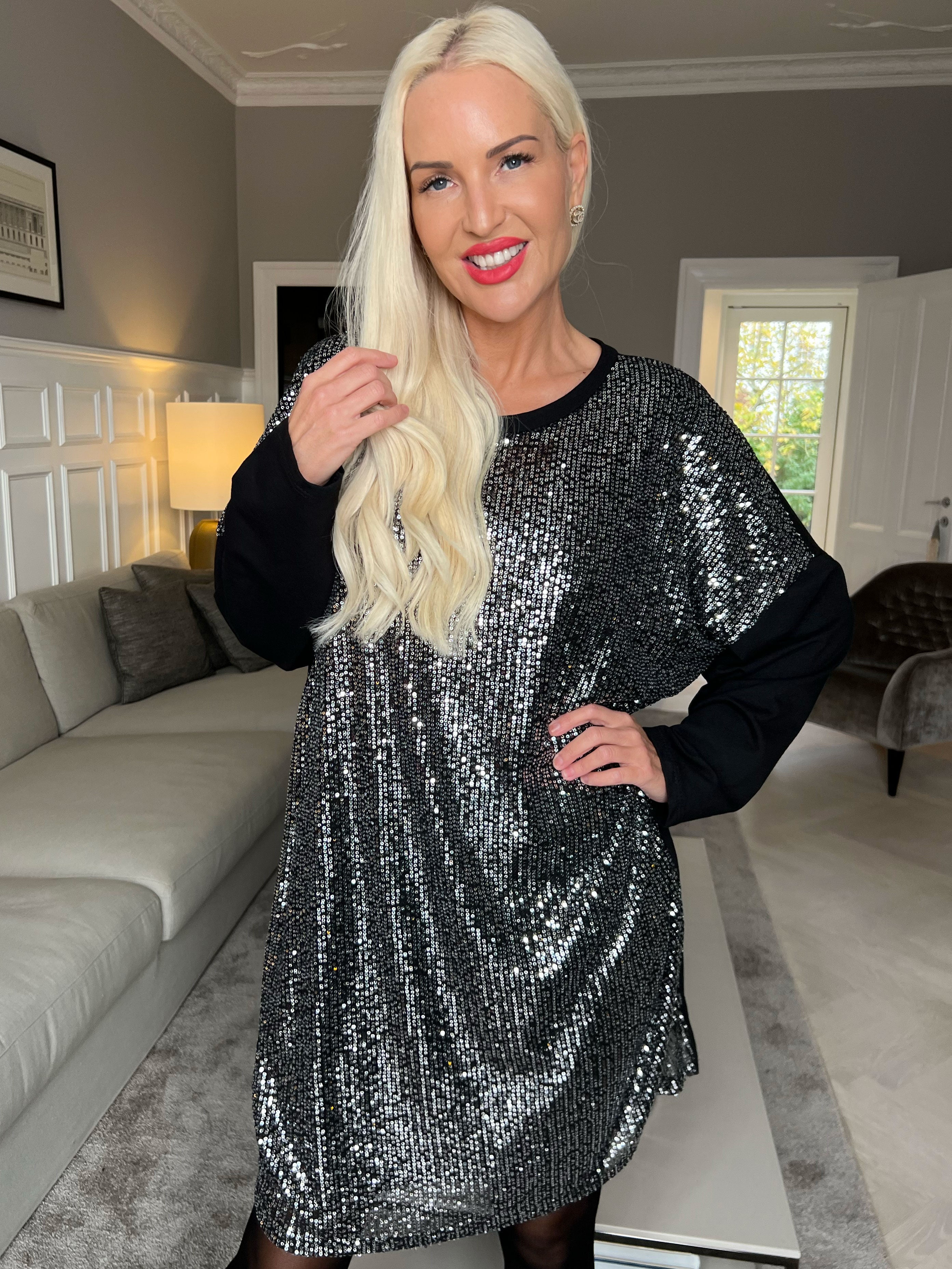 Eria - Klänning med paljetter på framsidan