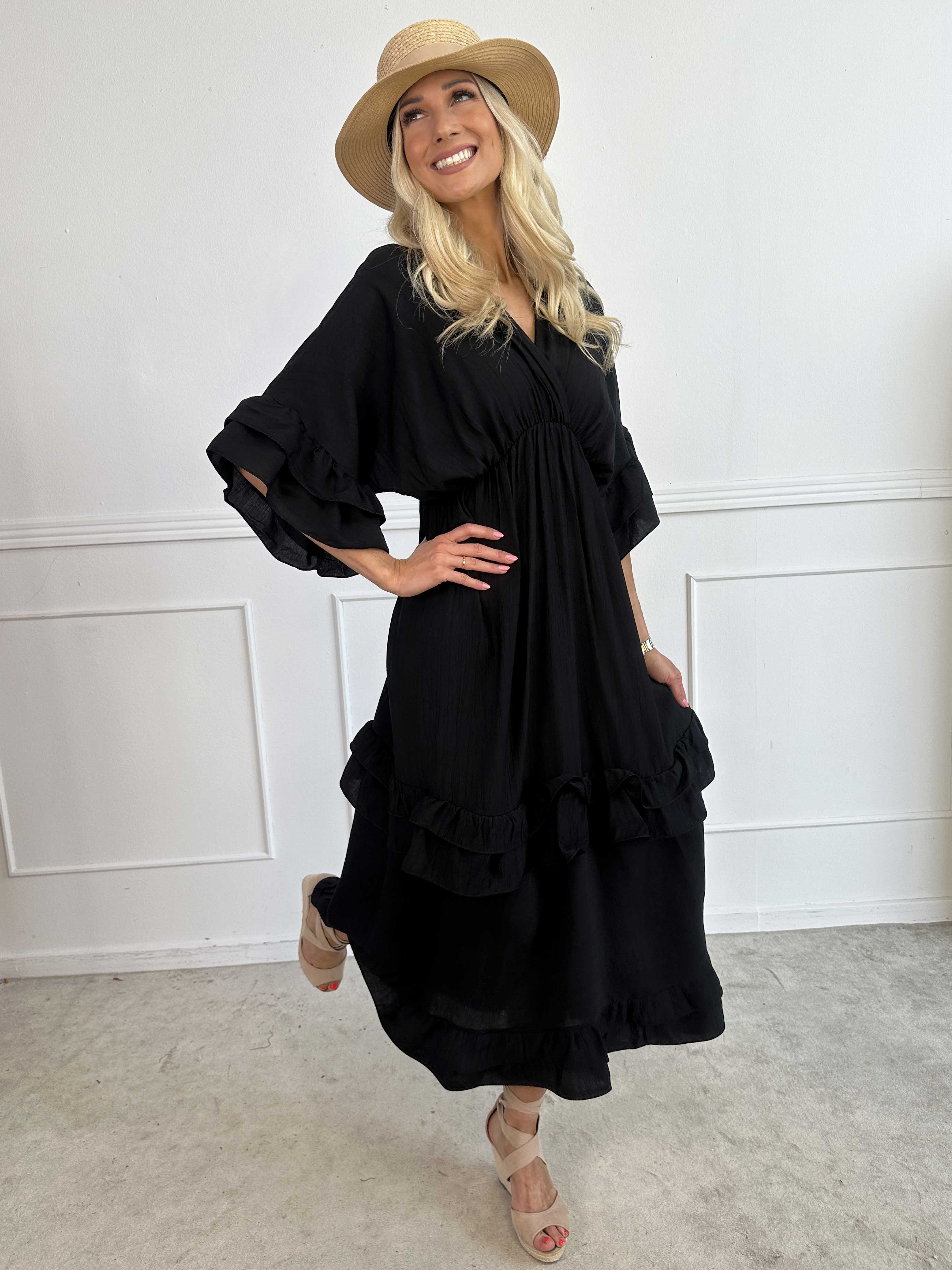 Europe - Söt långklänning i viskos med volangdetaljer