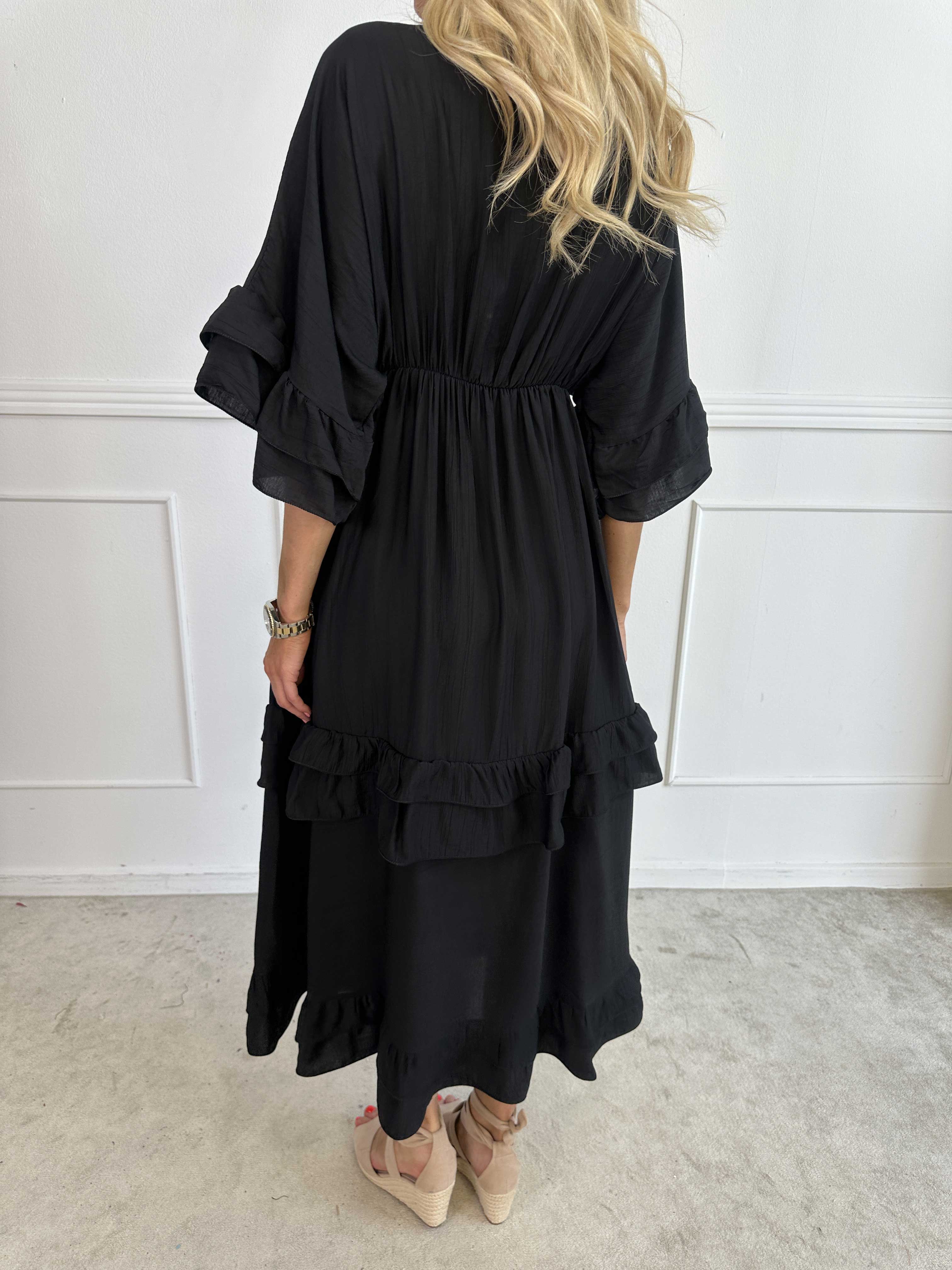 Europe - Söt långklänning i viskos med volangdetaljer