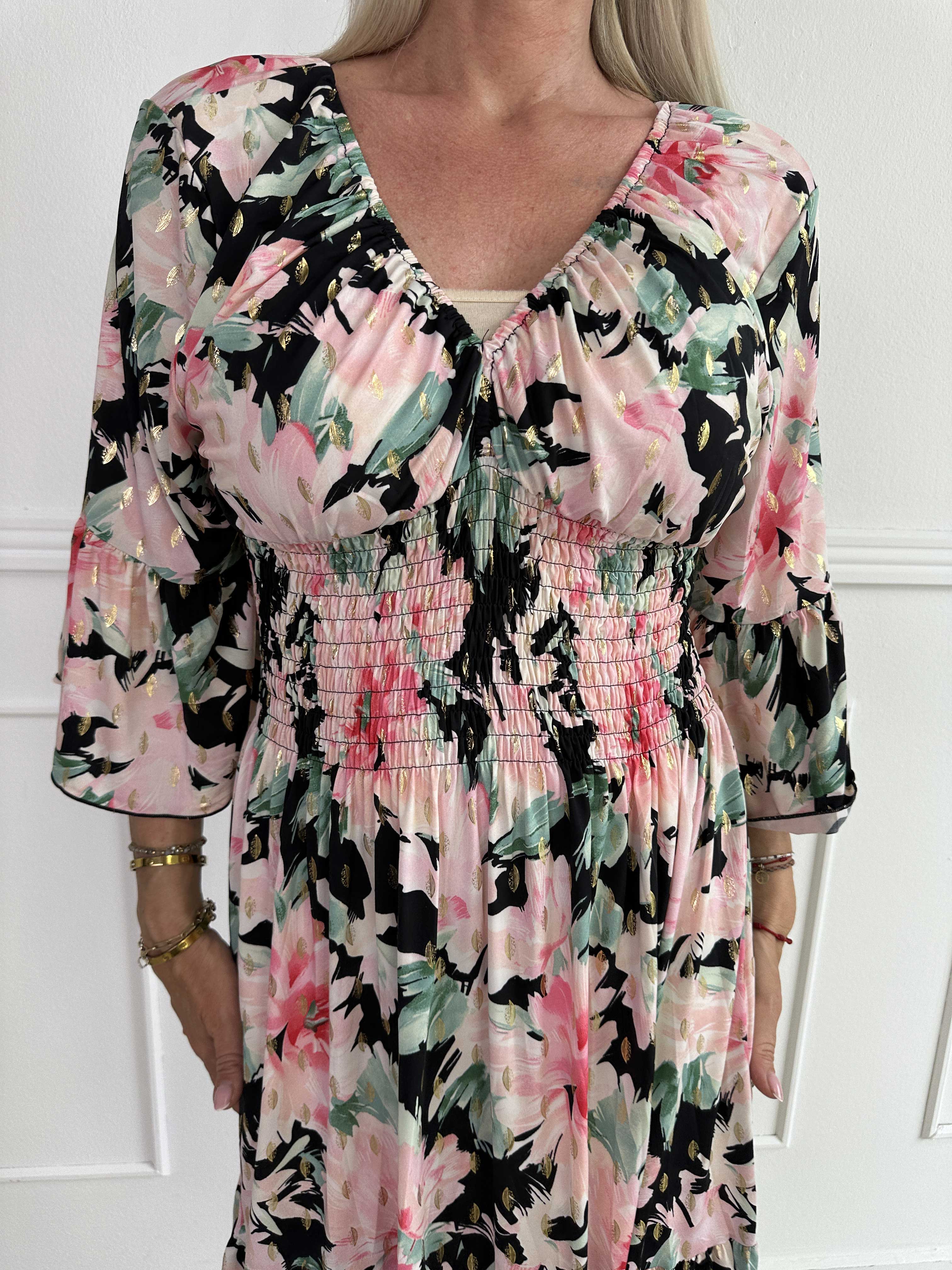 Flora Flower - Elastisk blommig klänning med resår och volang på ärmen