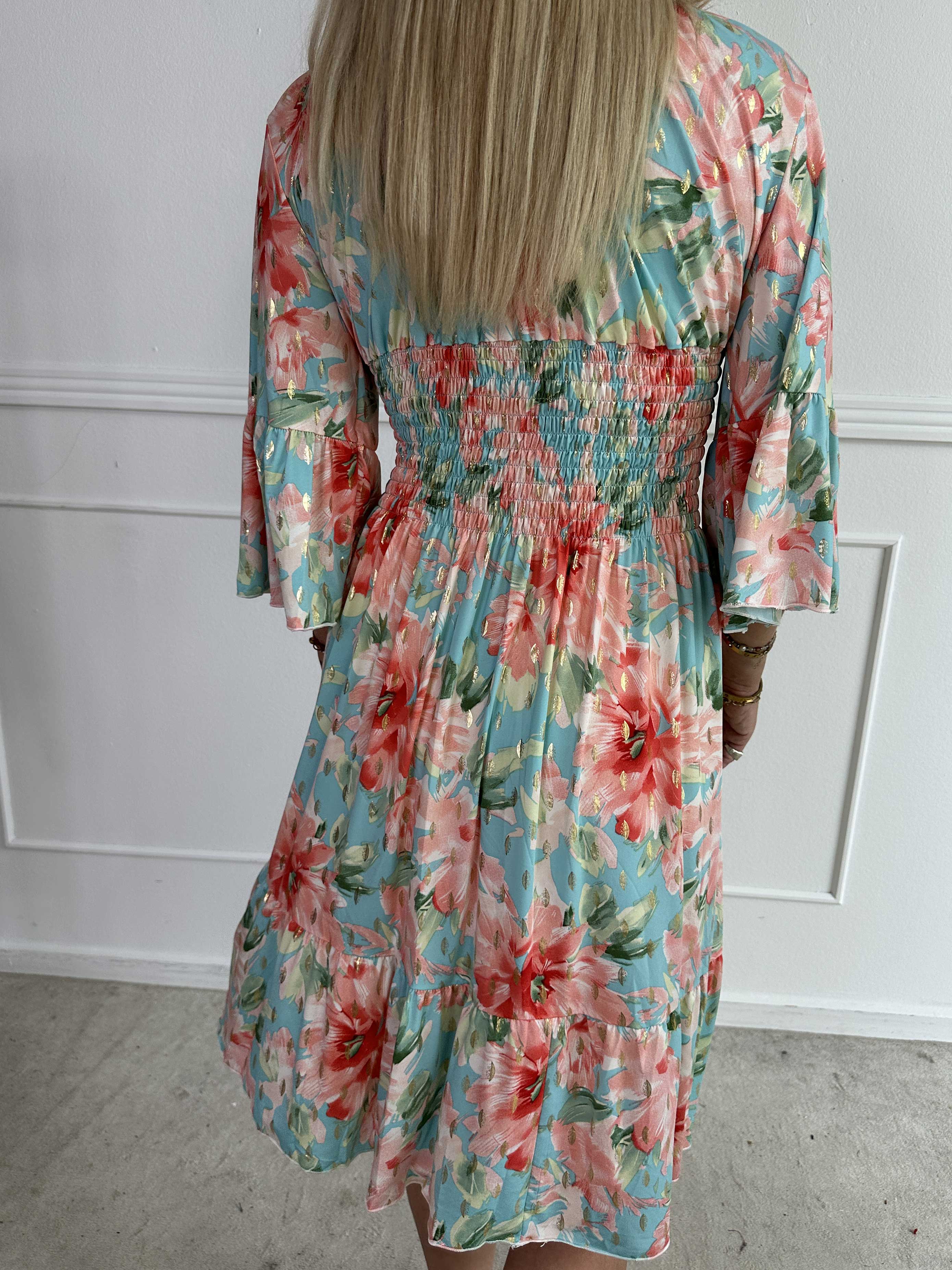 Flora Flower - Elastisk blommig klänning med resår och volang på ärmen