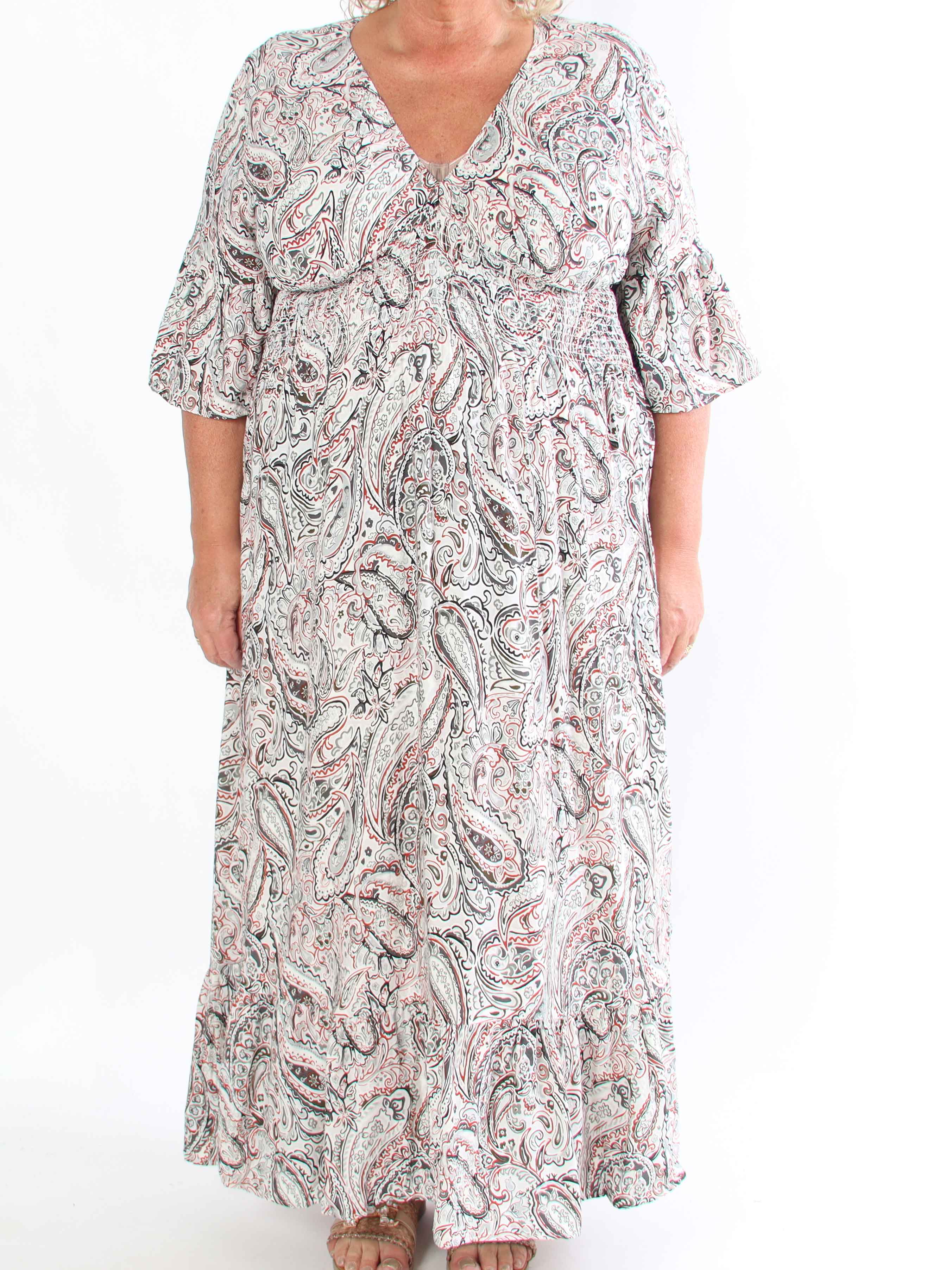 Freja - Mönstrad klänning med smockad midja