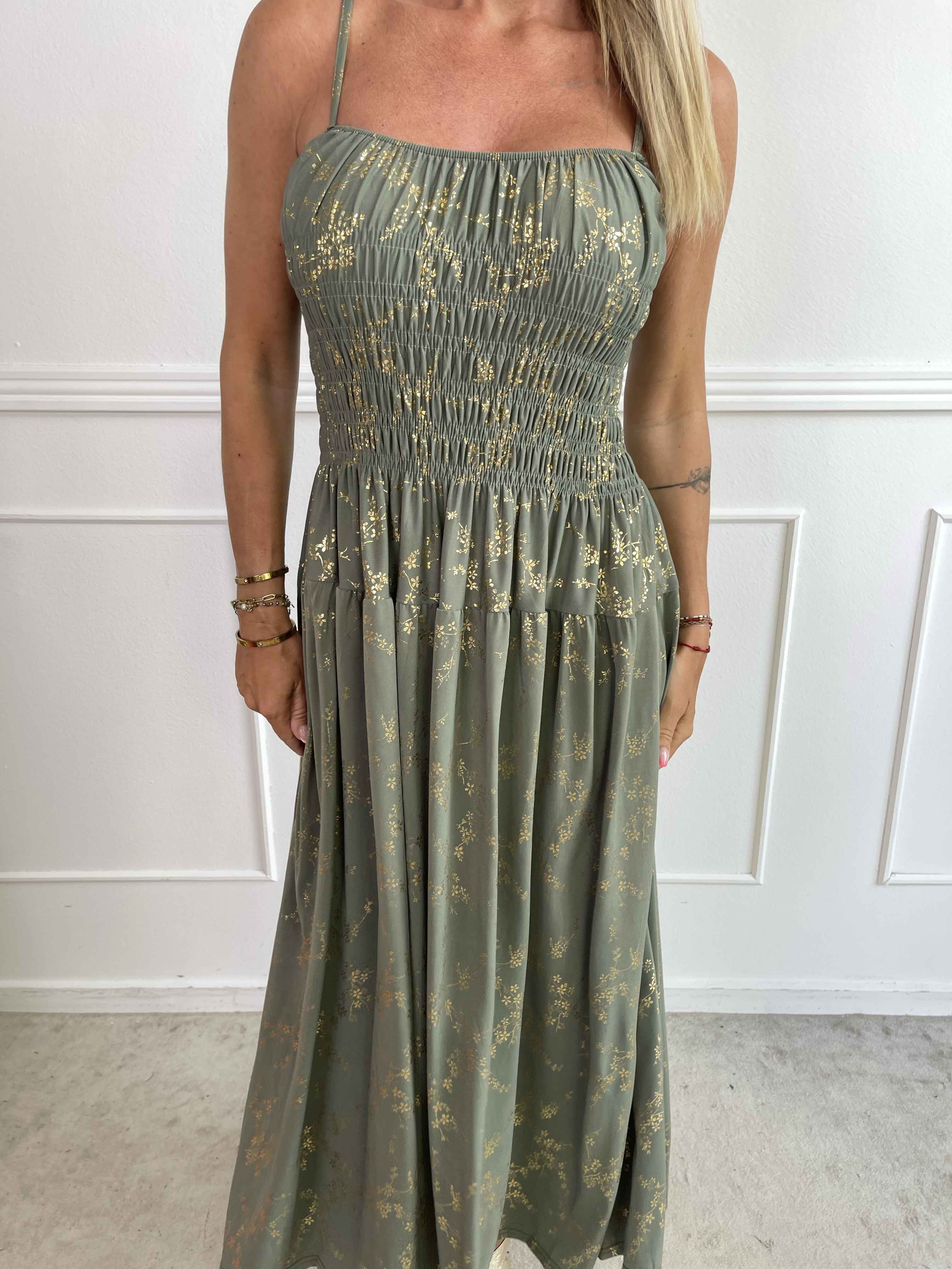 Maira Gold - Söt stretchig klänning med guldtryck och smock