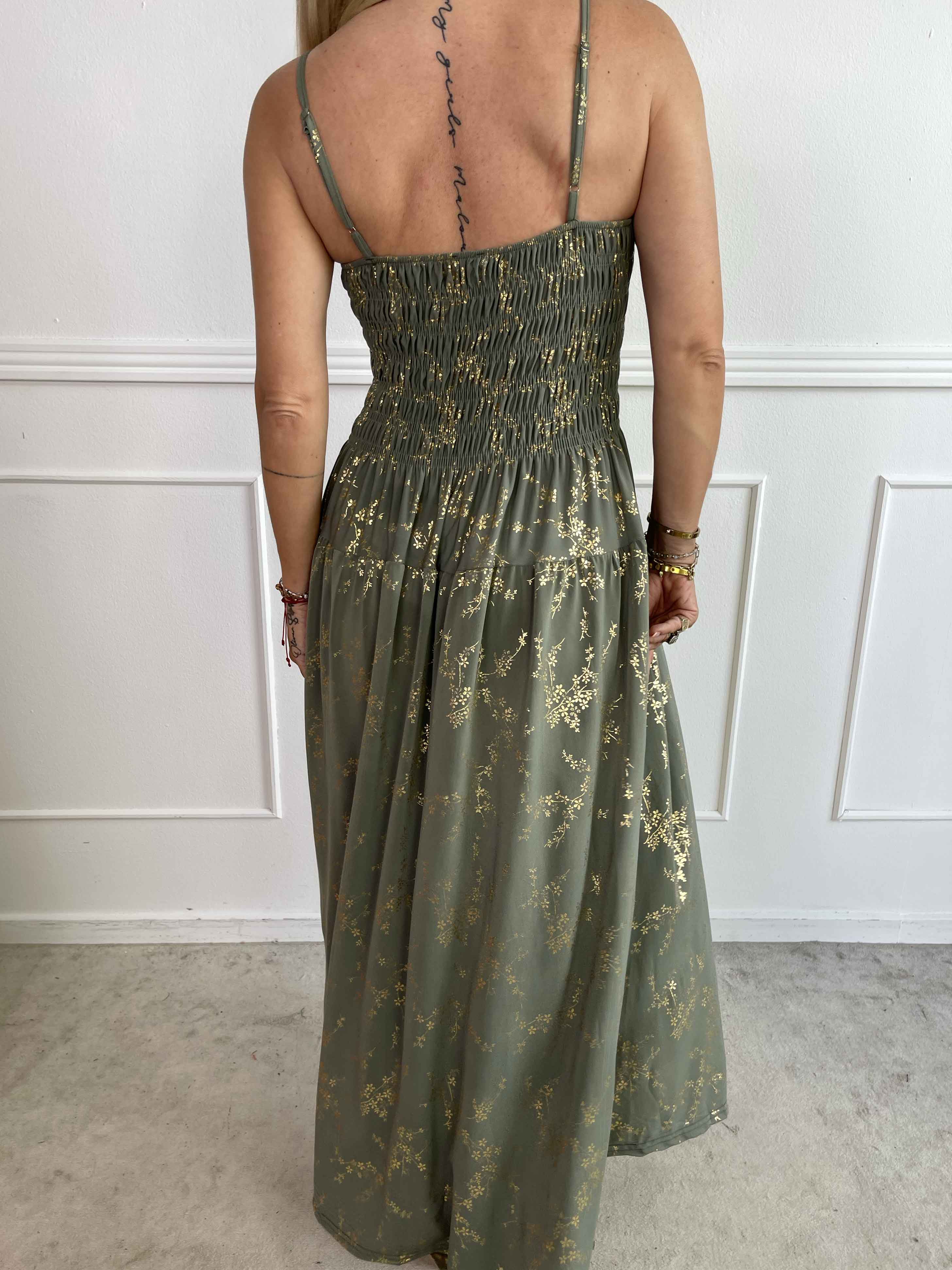 Maira Gold - Söt stretchig klänning med guldtryck och smock