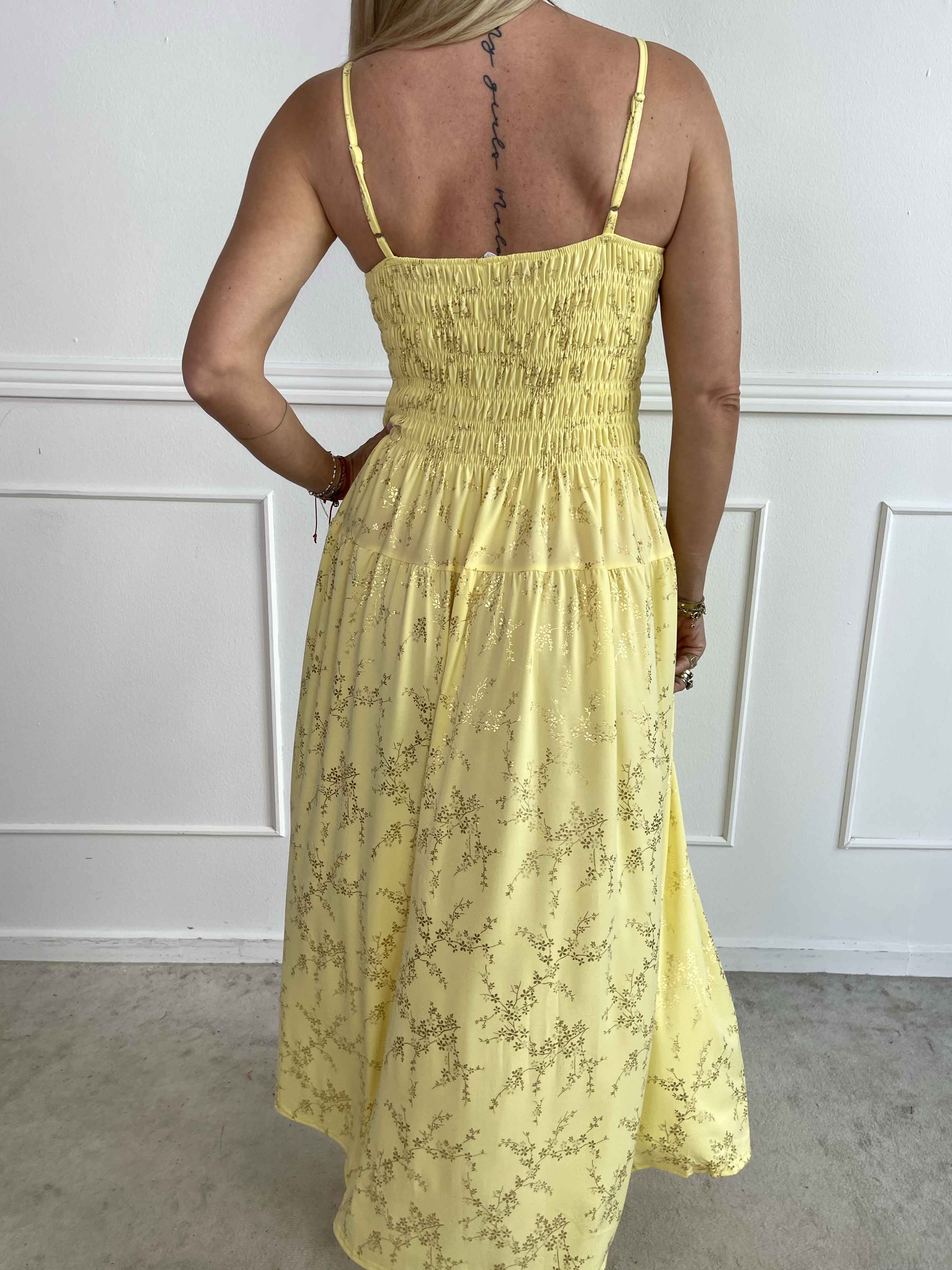 Maira Gold - Söt stretchig klänning med guldtryck och smock