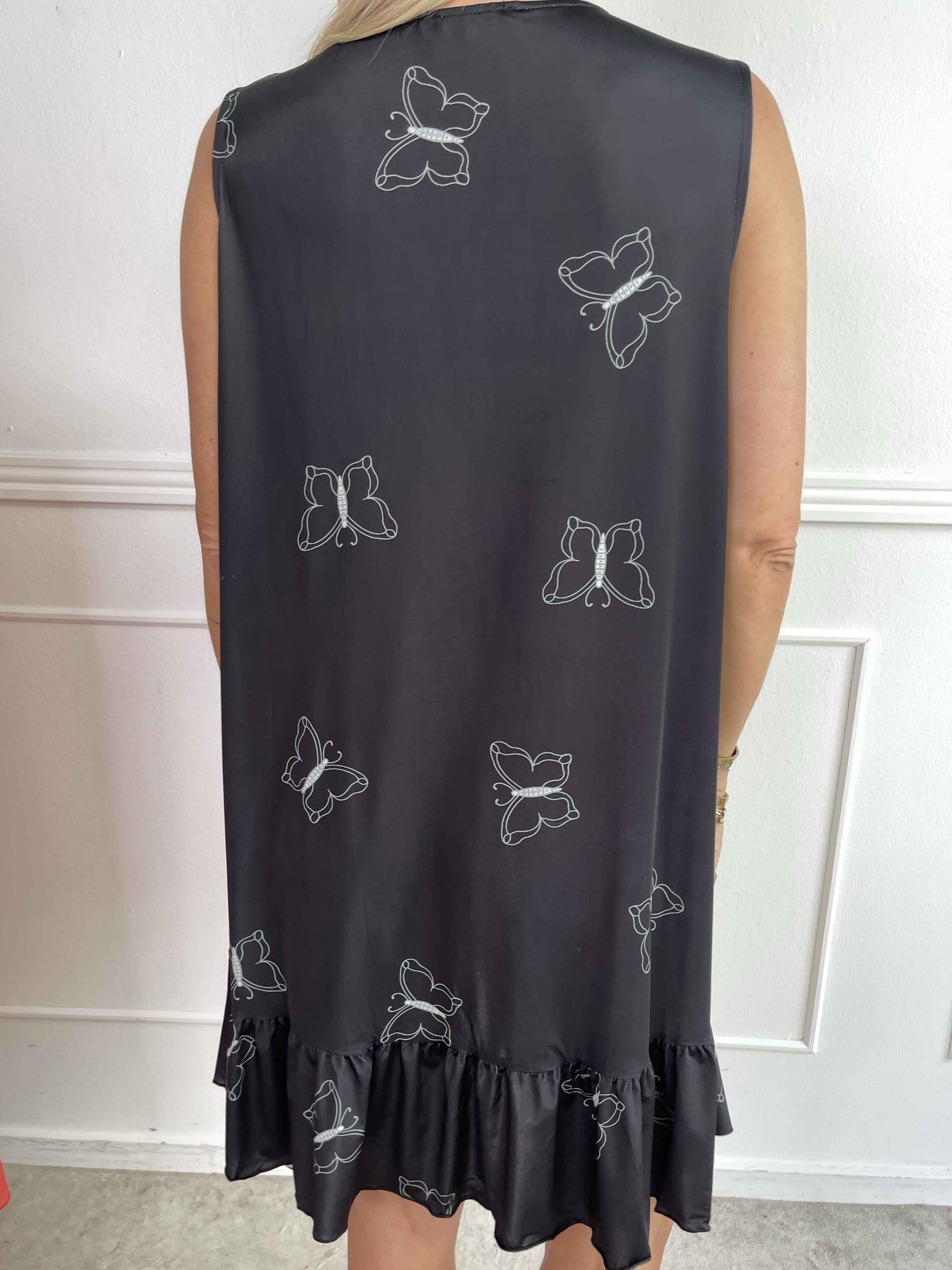 Aurelia - Sommarklänning med fjärilstryck och volangkant