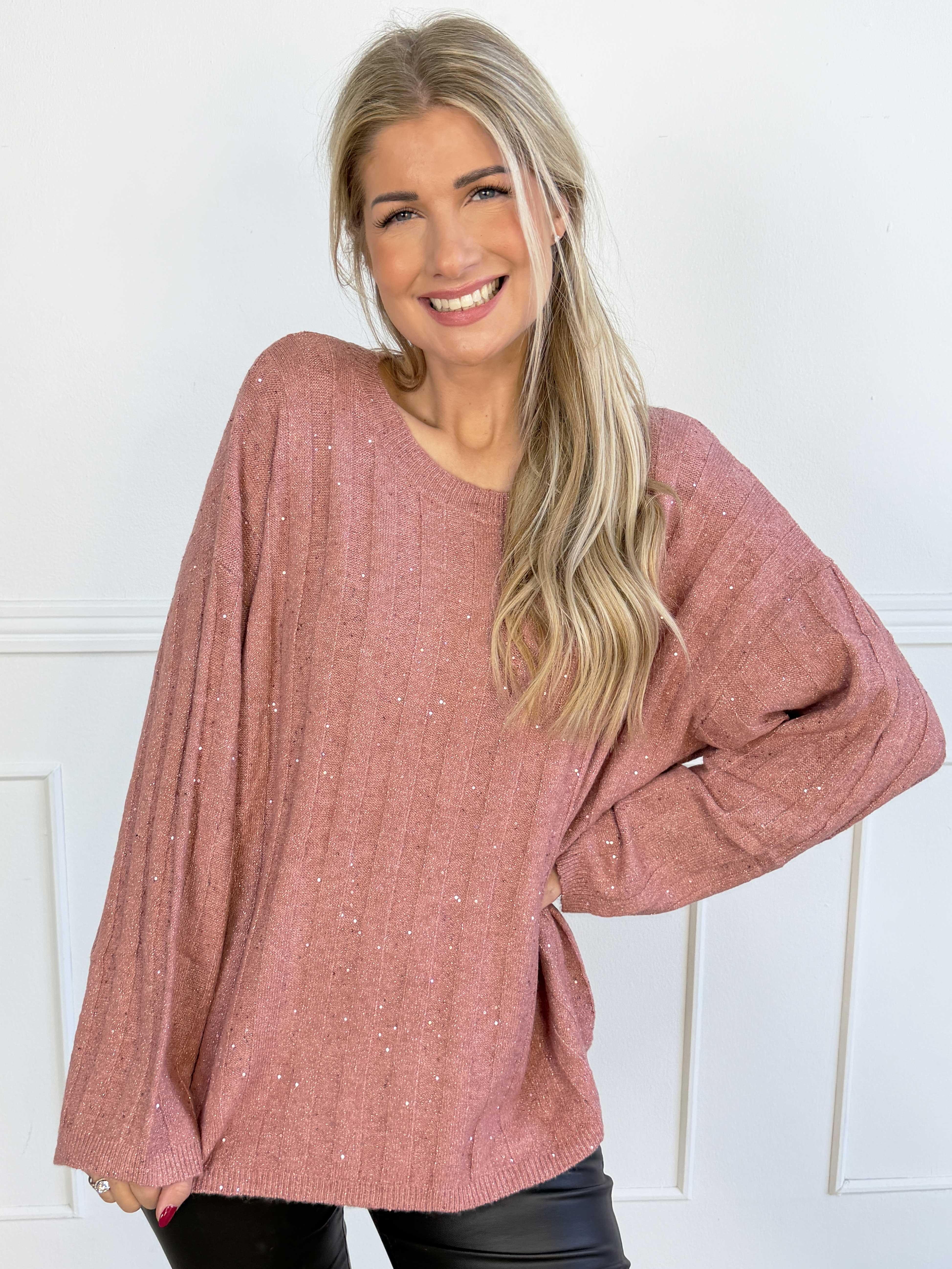 Freja - Fin stickad tröja med glittrande trådar och små paljetter som ger en elegant och festlig touch