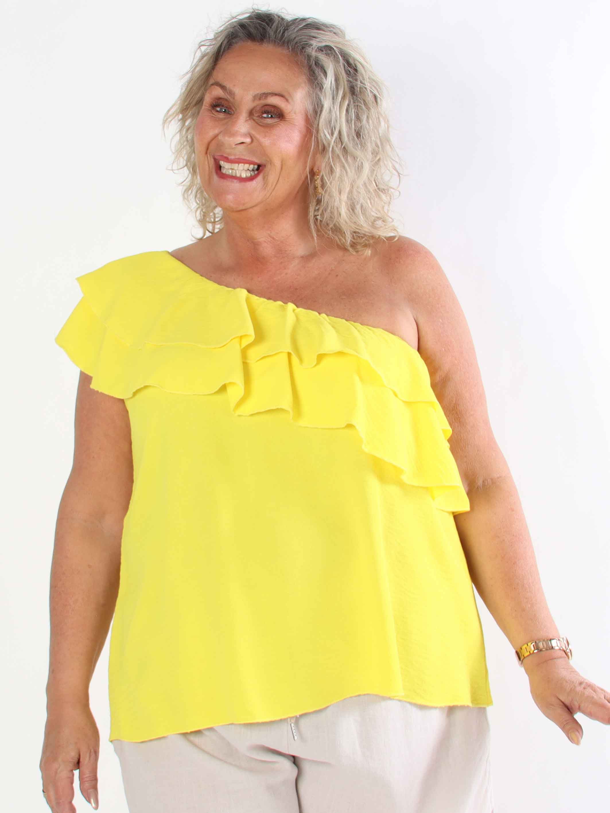 Catelyn Top - Söt one shoulder topp med volanger