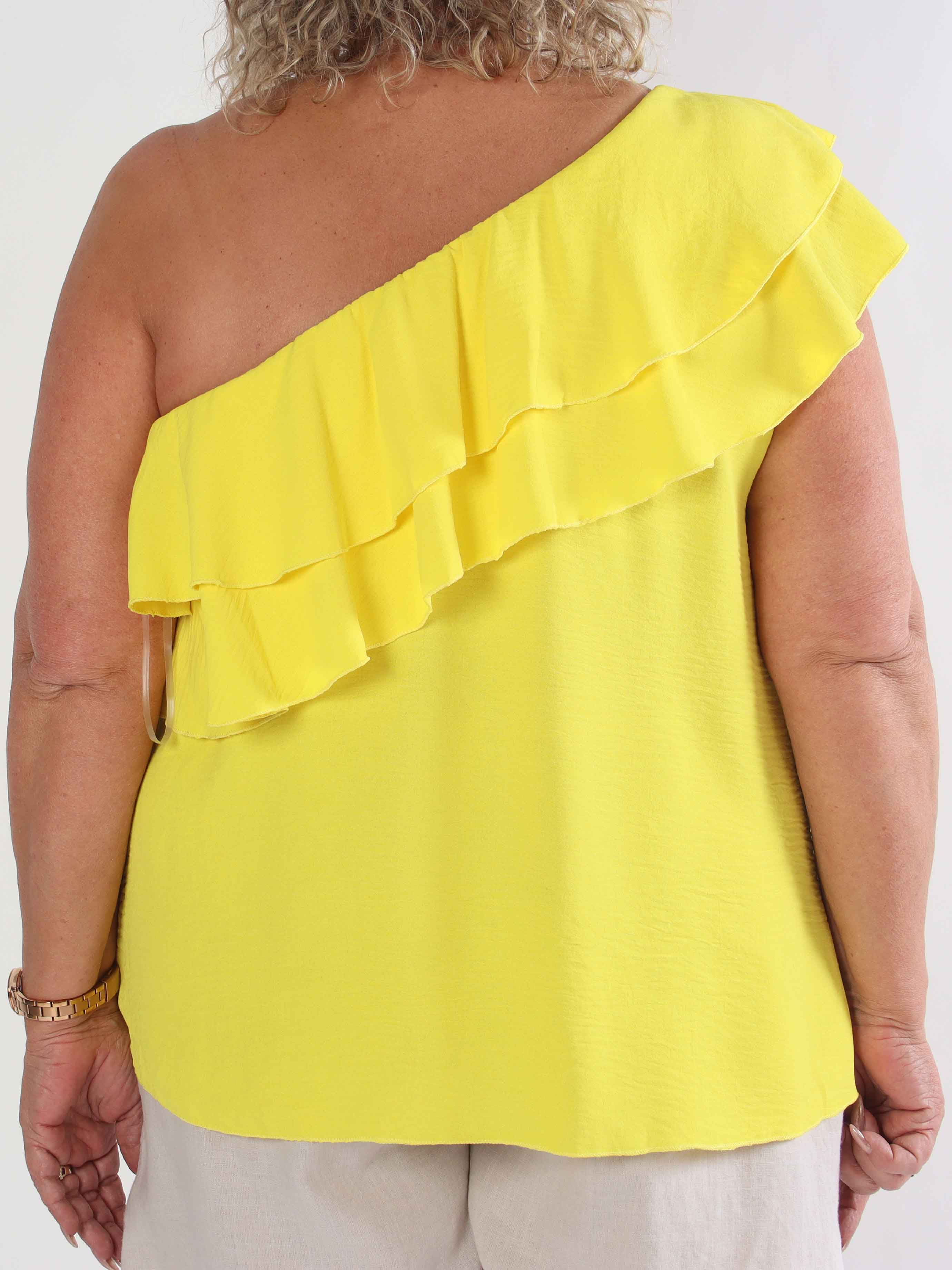 Catelyn Top - Söt one shoulder topp med volanger