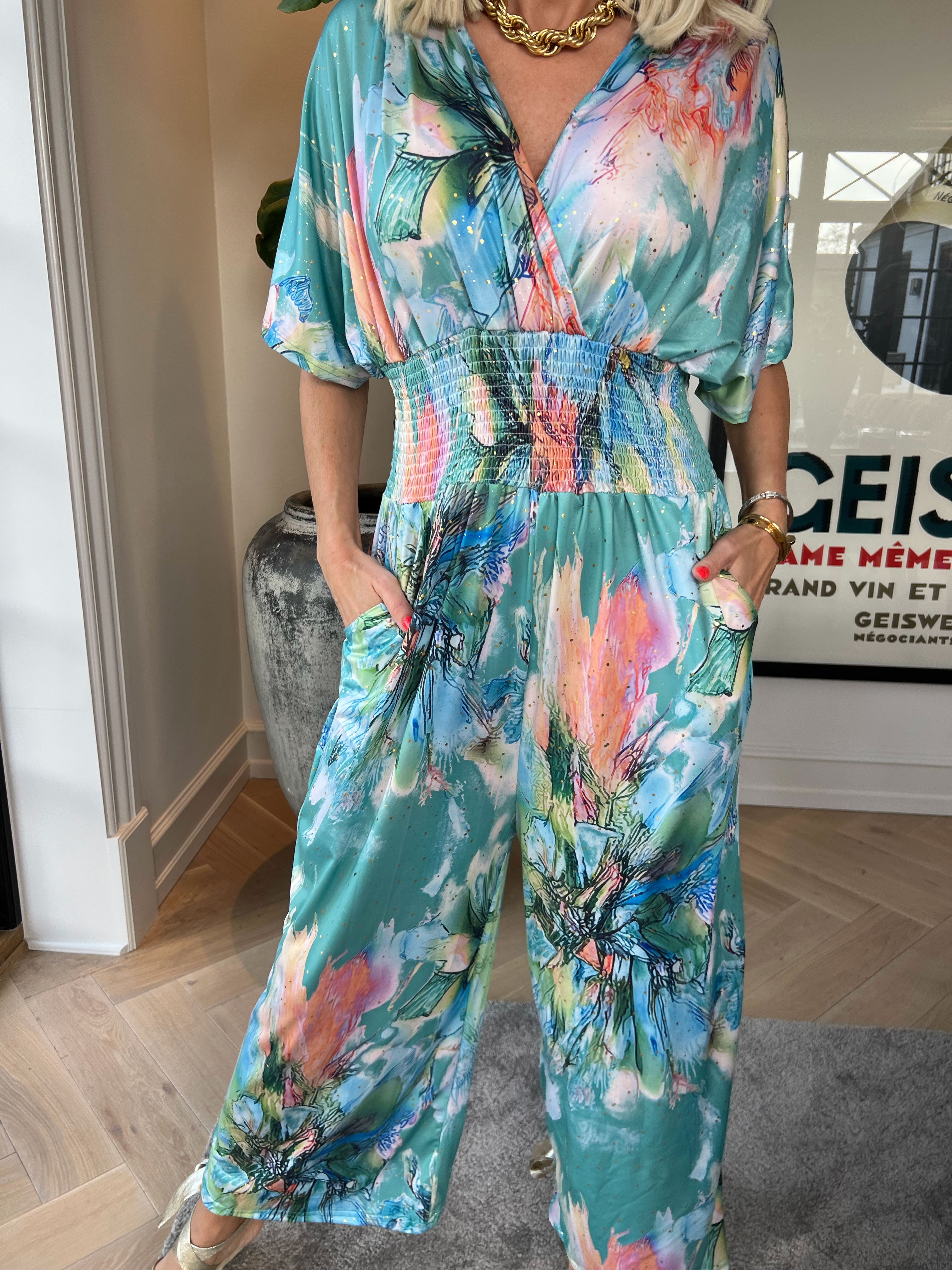 Pams Print Jumpsuit - Stretchig mönstrad jumpsuit med guldfärgat damm