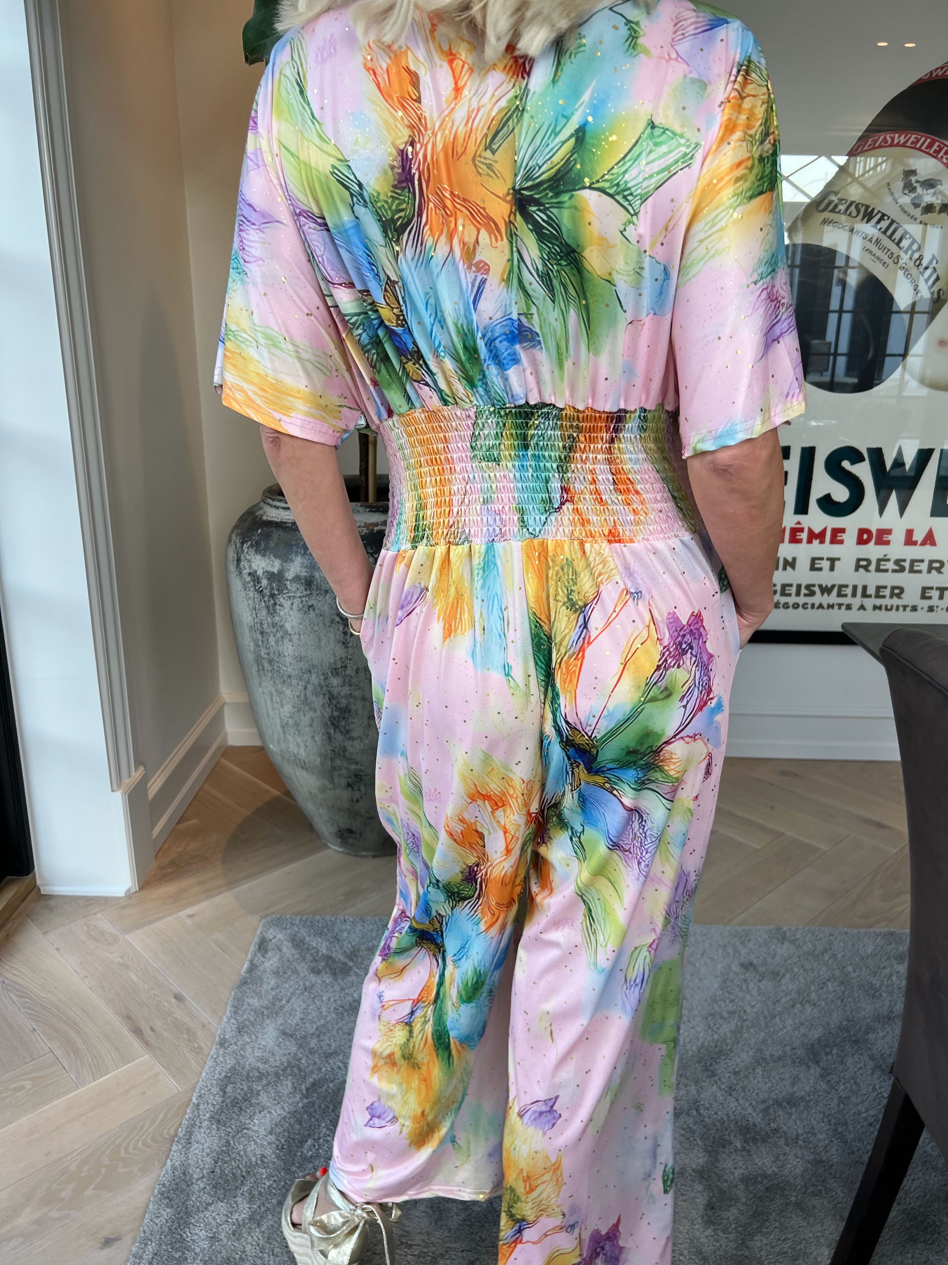 Pams Print Jumpsuit - Stretchig mönstrad jumpsuit med guldfärgat damm