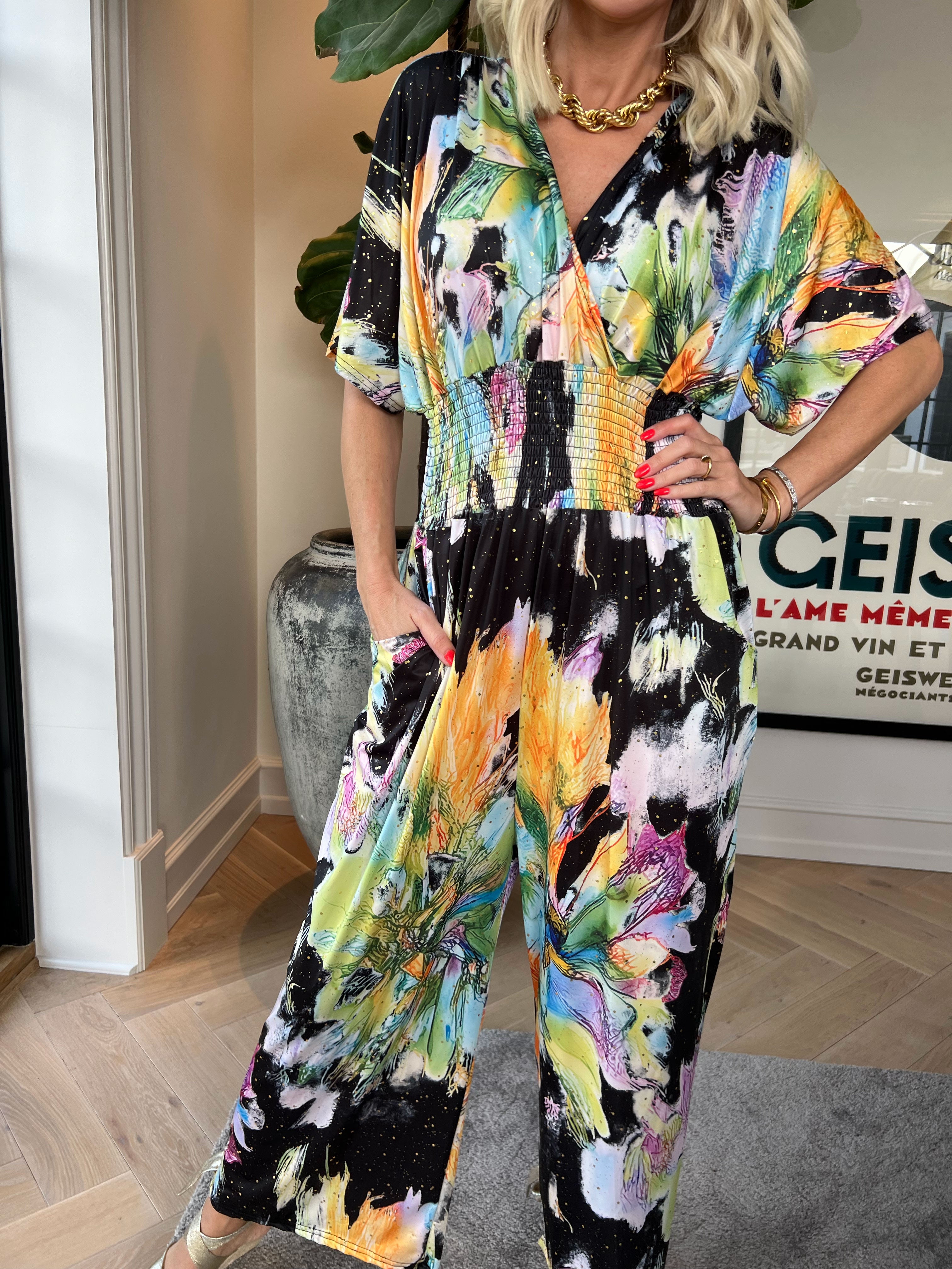 Pams Print Jumpsuit - Stretchig mönstrad jumpsuit med guldfärgat damm