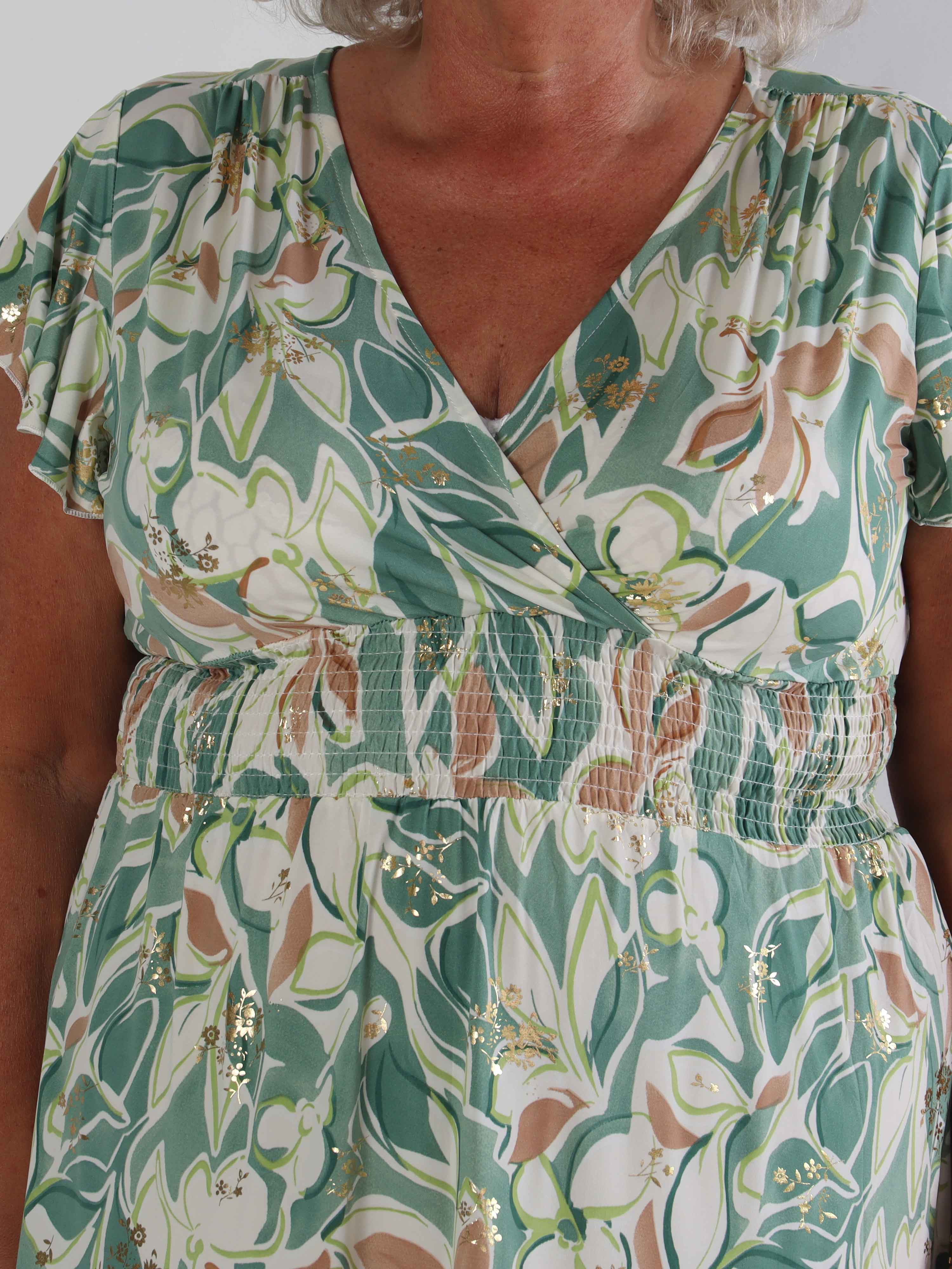 Palmira - Mönstrad elastisk plus size klänning med lager på lager look