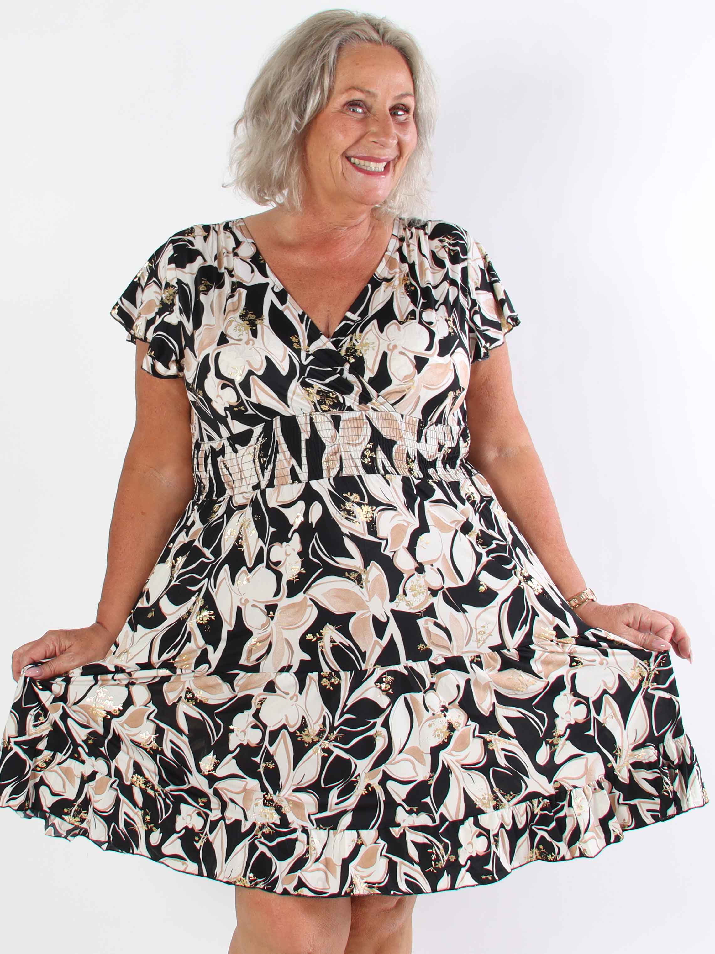 Palmira - Mönstrad elastisk plus size klänning med lager på lager look