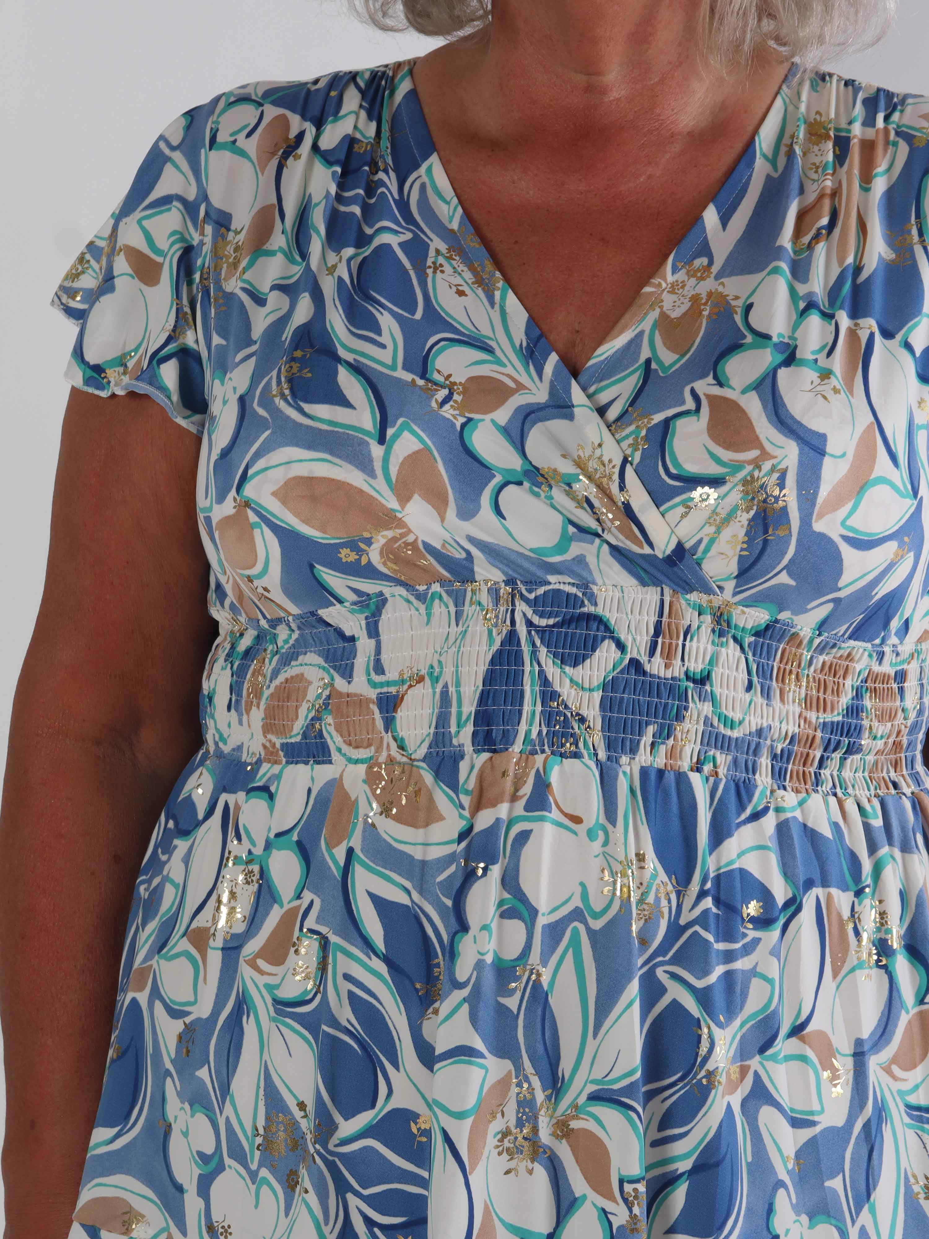 Palmira - Mönstrad elastisk plus size klänning med lager på lager look