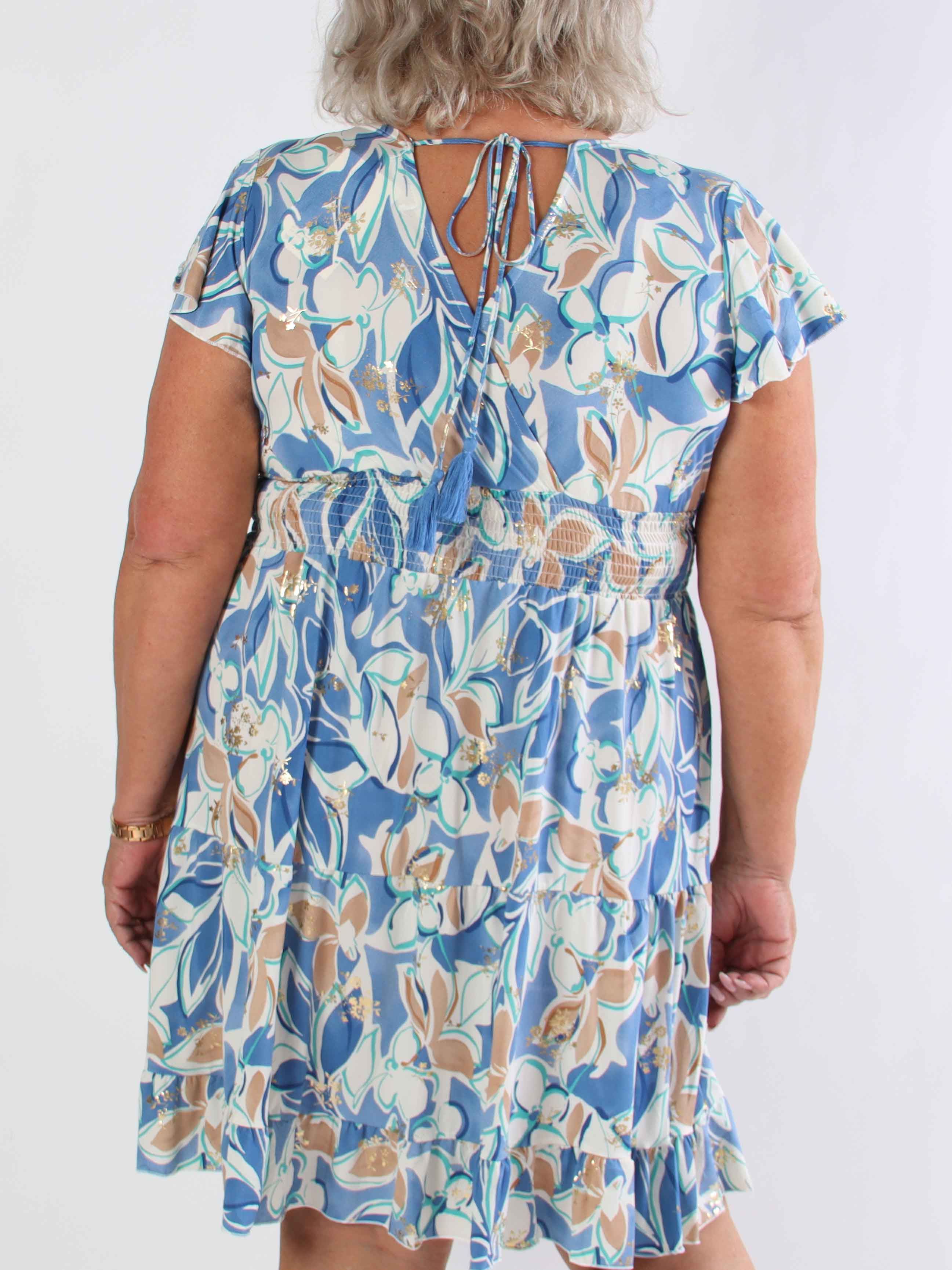 Palmira - Mönstrad elastisk plus size klänning med lager på lager look