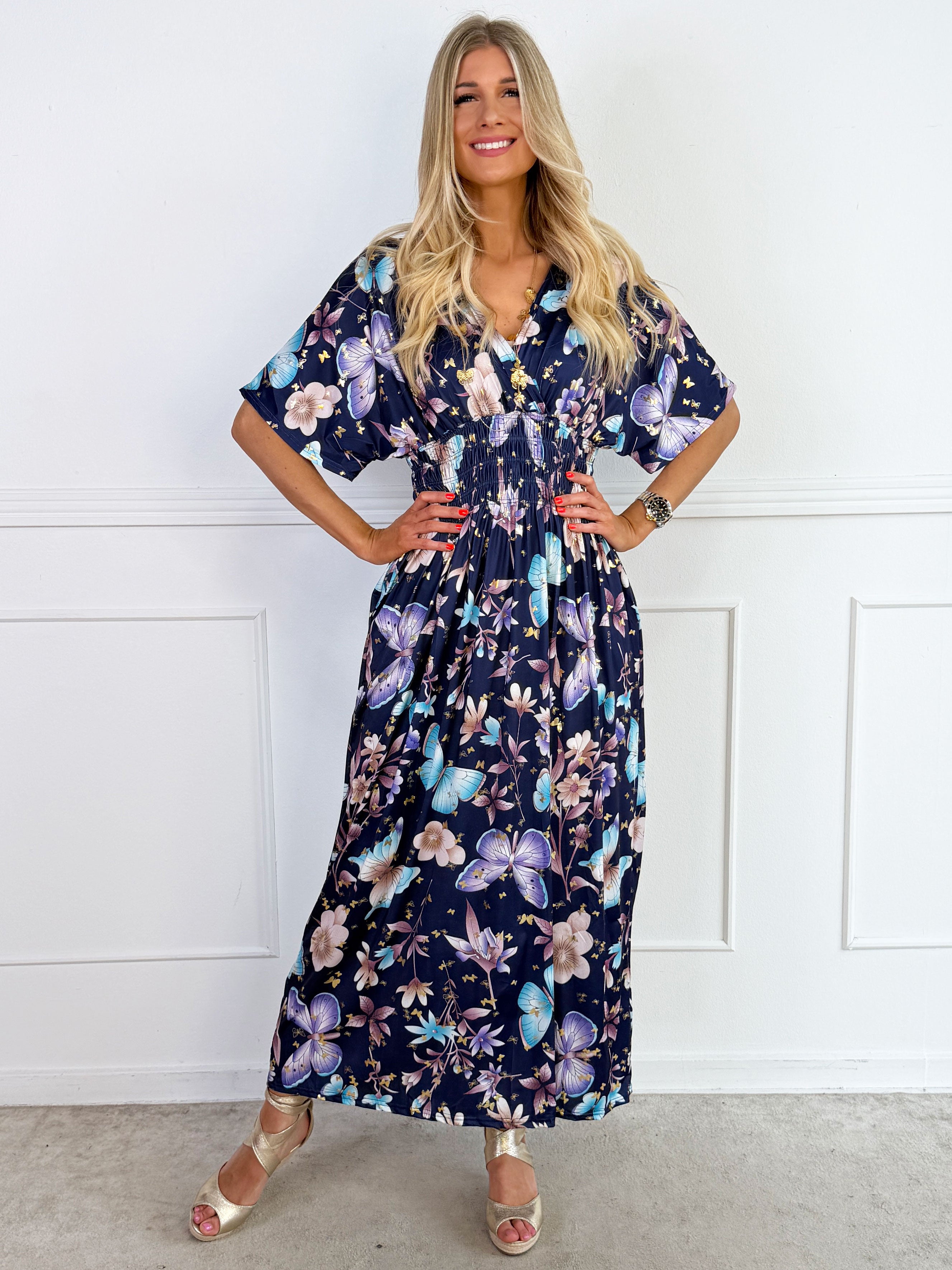 Pams Fairytale - Lång stretchig klänning i fint blom- och fjärilstryck