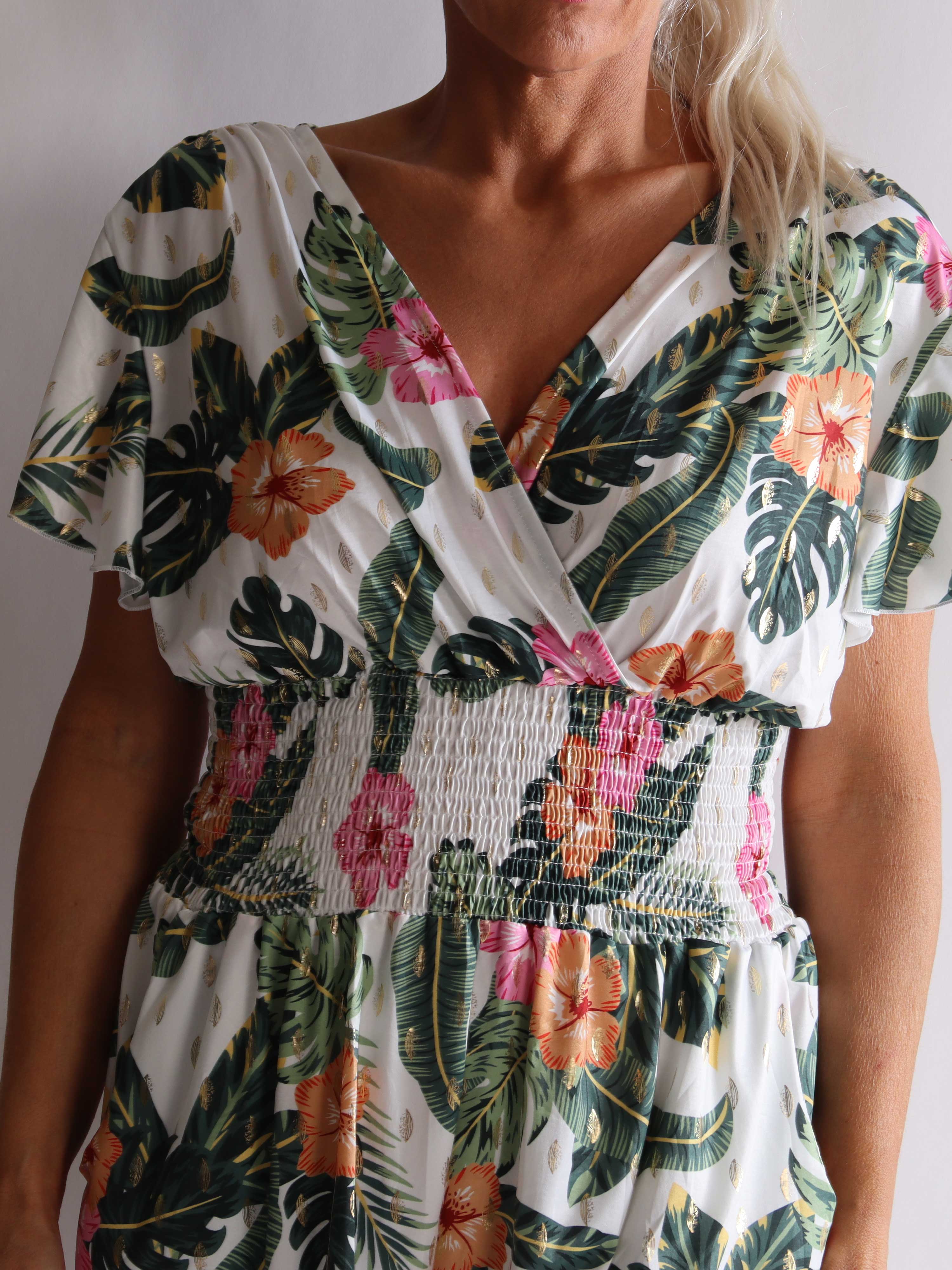 Pams Flower Playsuit - Elastisk playsuit i plusstorlek med fickor