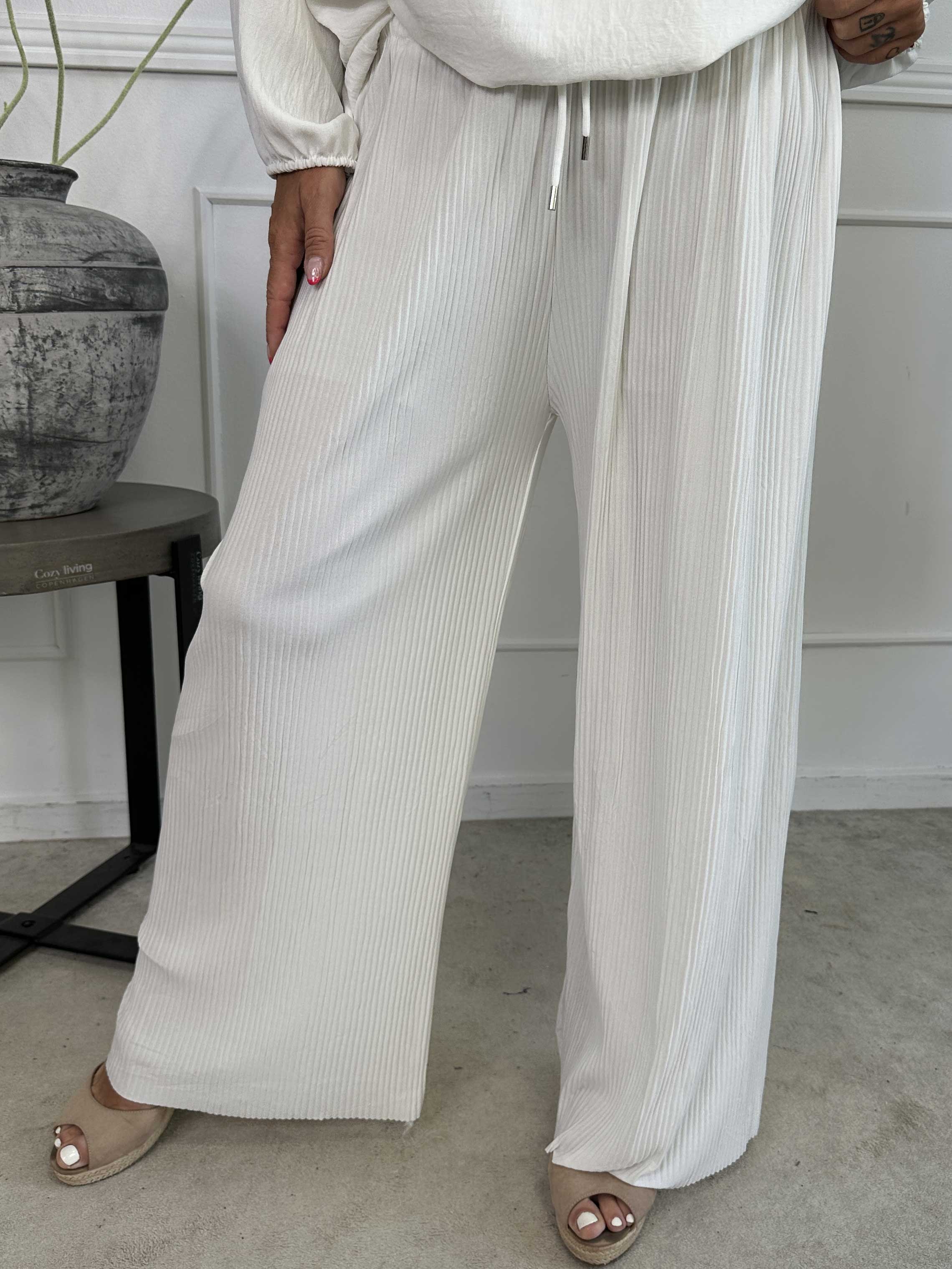 Angeline - Lösa plisserade byxor med resår i midjan