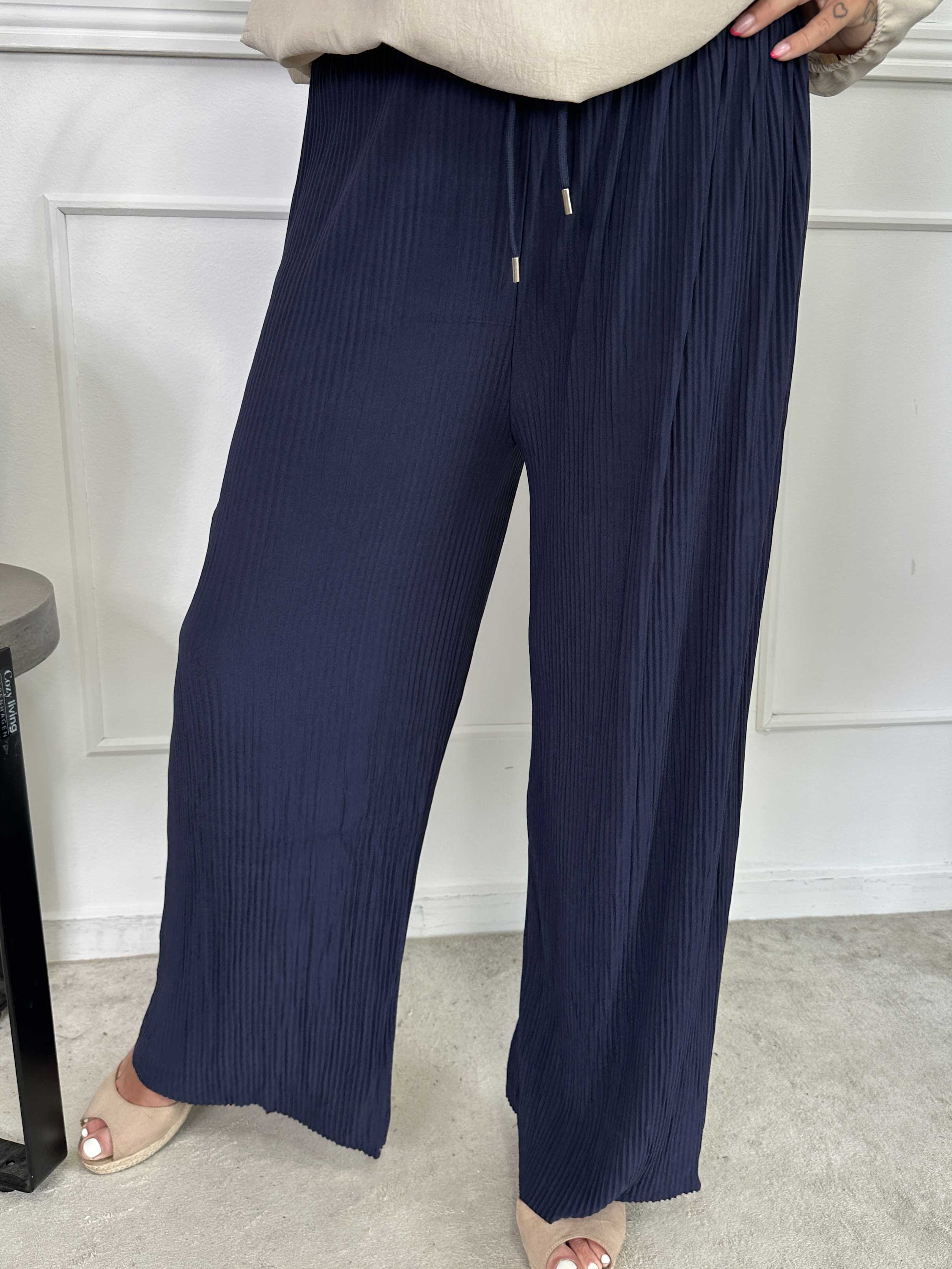 Angeline - Lösa plisserade byxor med resår i midjan