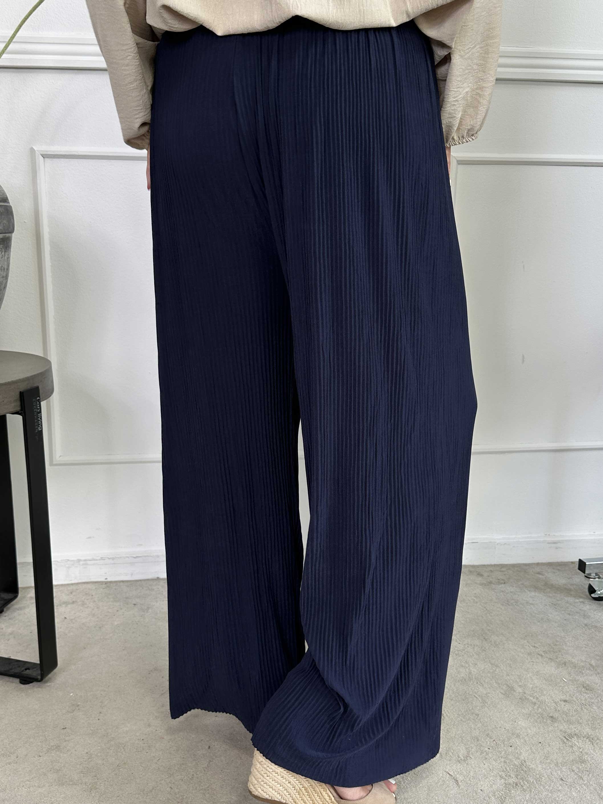 Angeline - Lösa plisserade byxor med resår i midjan