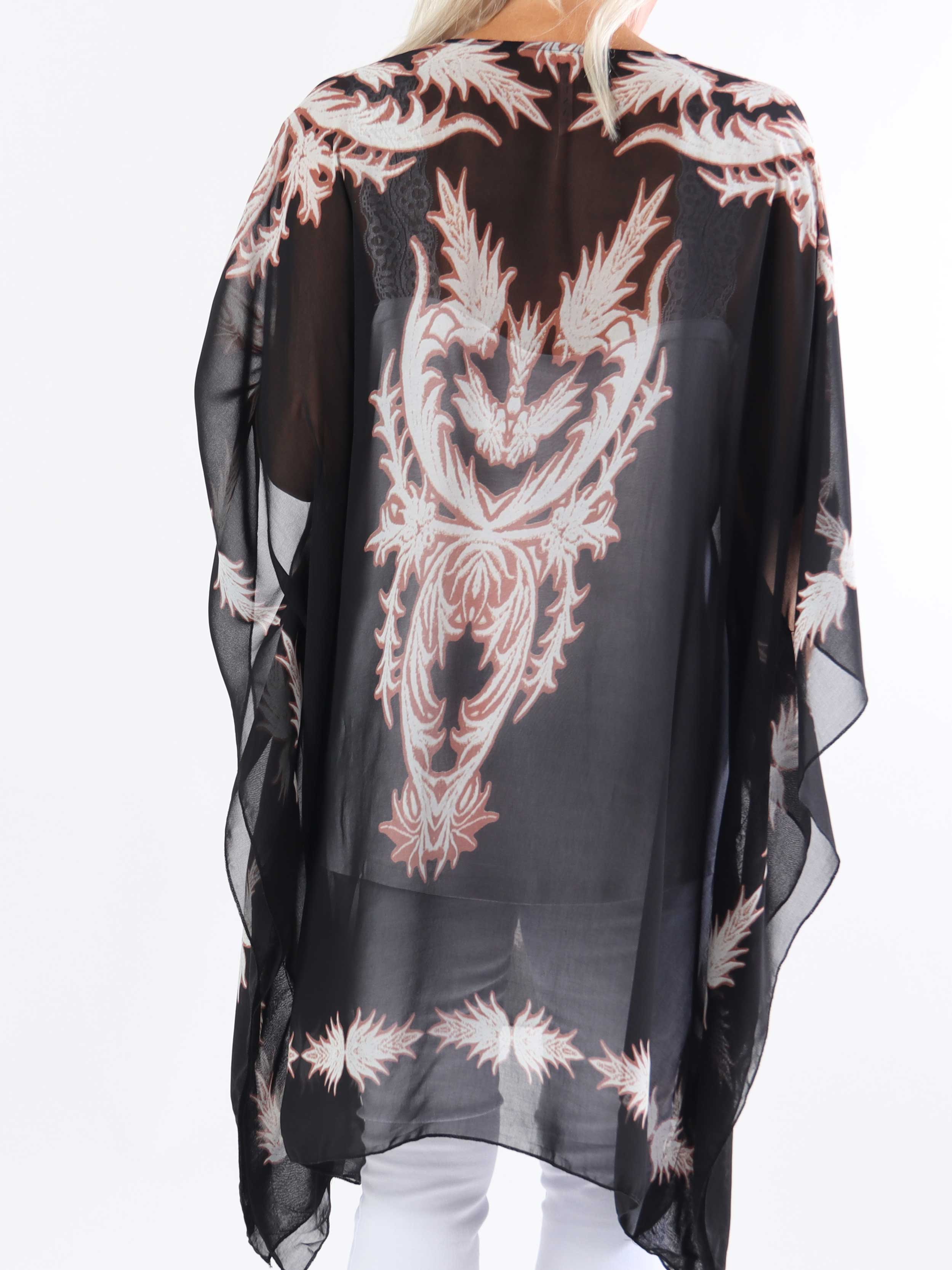 Josefina - Halvgenomskinlig plus size-tunika med dragsko