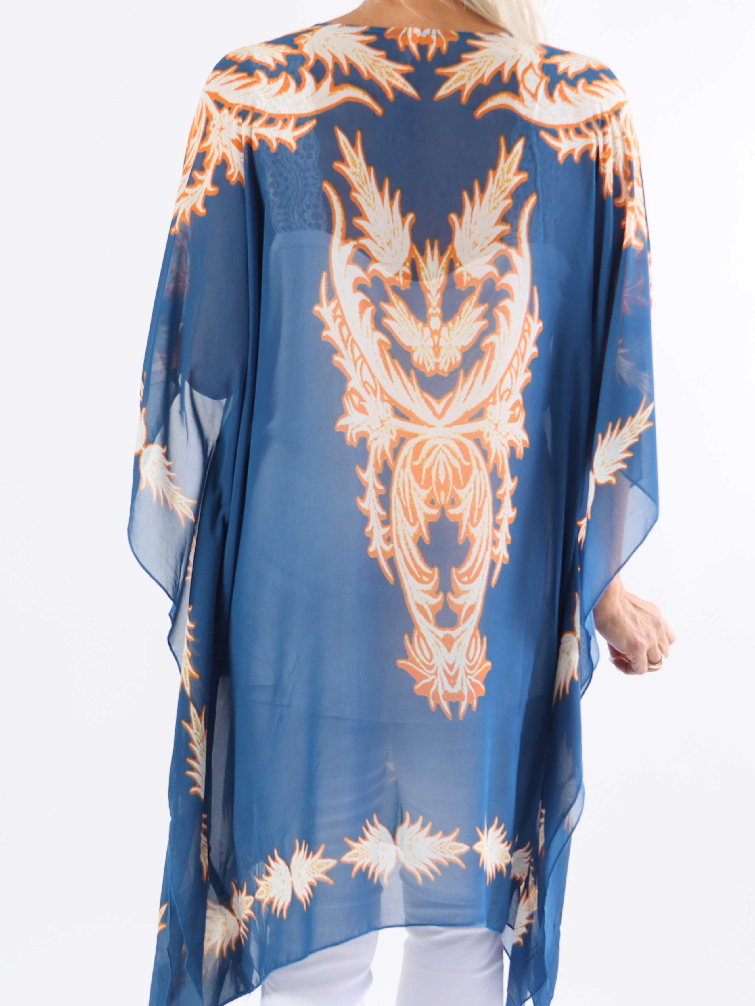 Josefina - Halvgenomskinlig plus size-tunika med dragsko