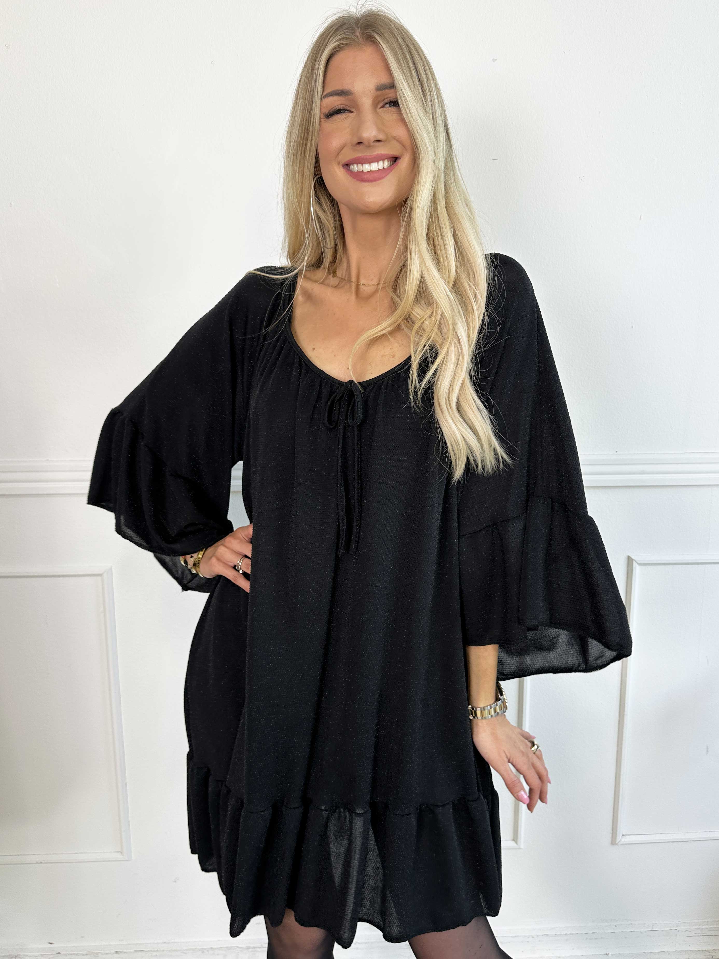 Novia Glitter - Elastisk klänning med glittertrådar och volanger