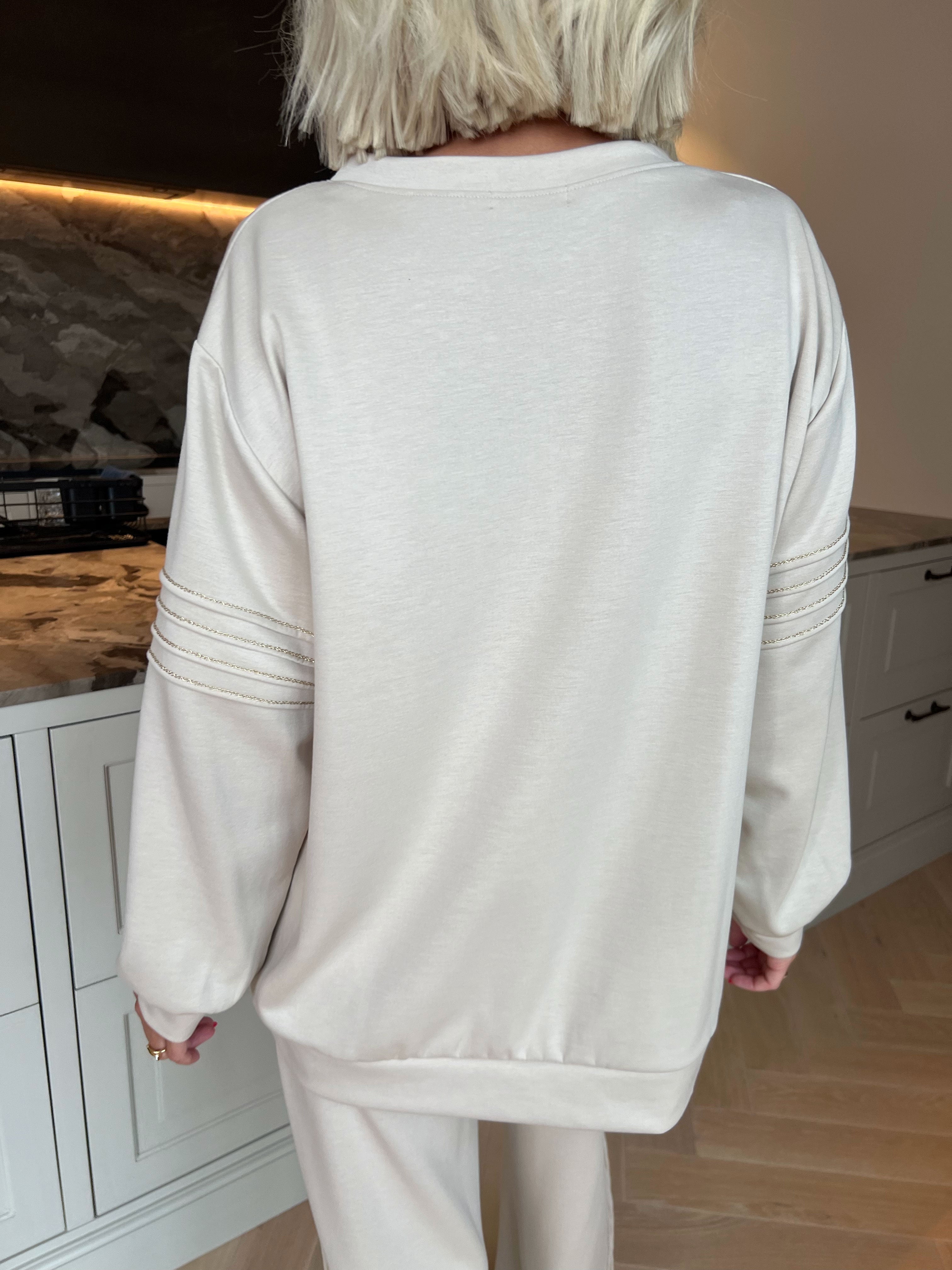 Dream – Mjukt plus size träningsoverallset i viskos med eleganta gulddetaljer