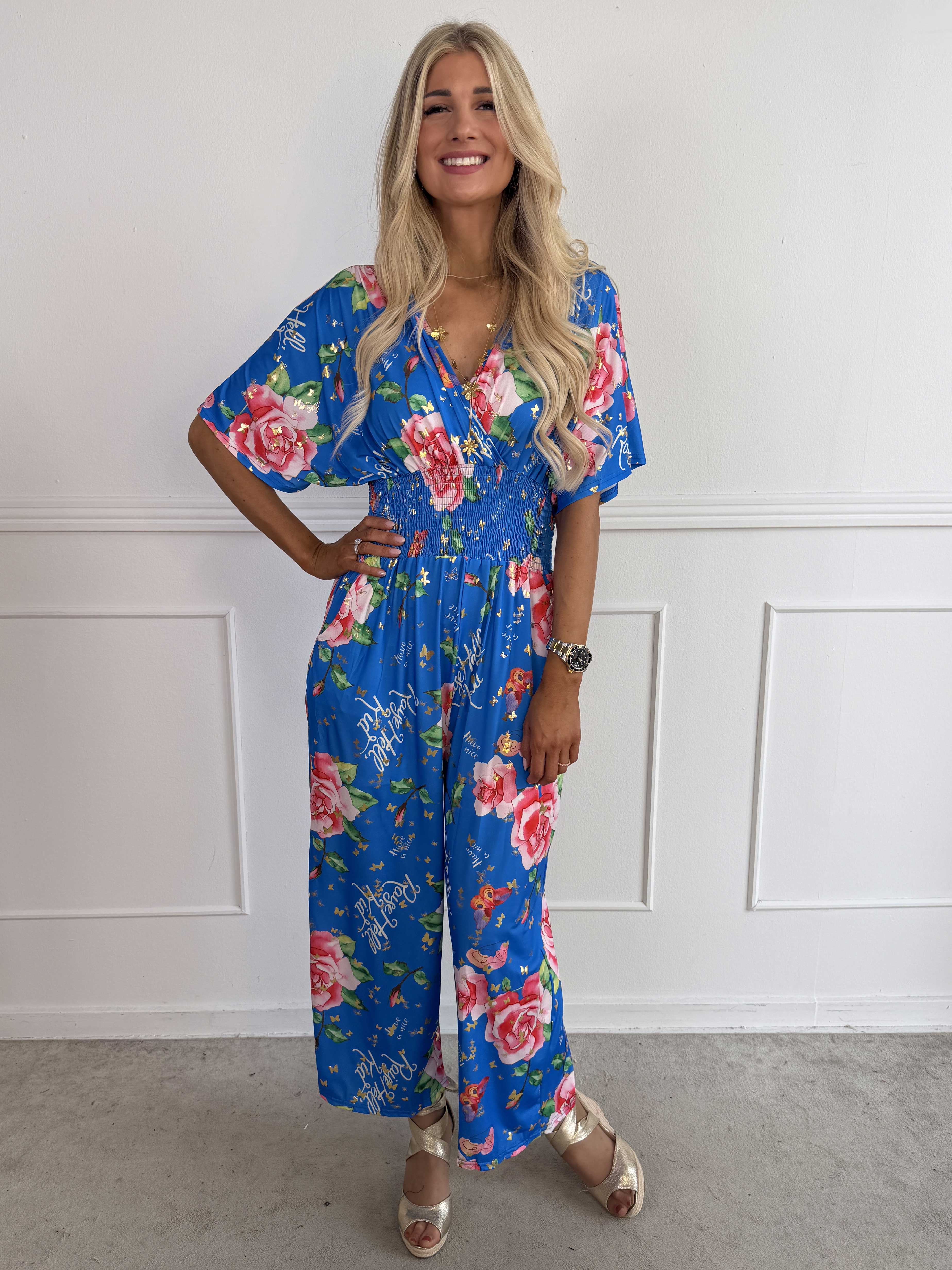 Pams Raise Jumpsuit - Elastisk buksedragt med blomsterr og guldsommerfugle
