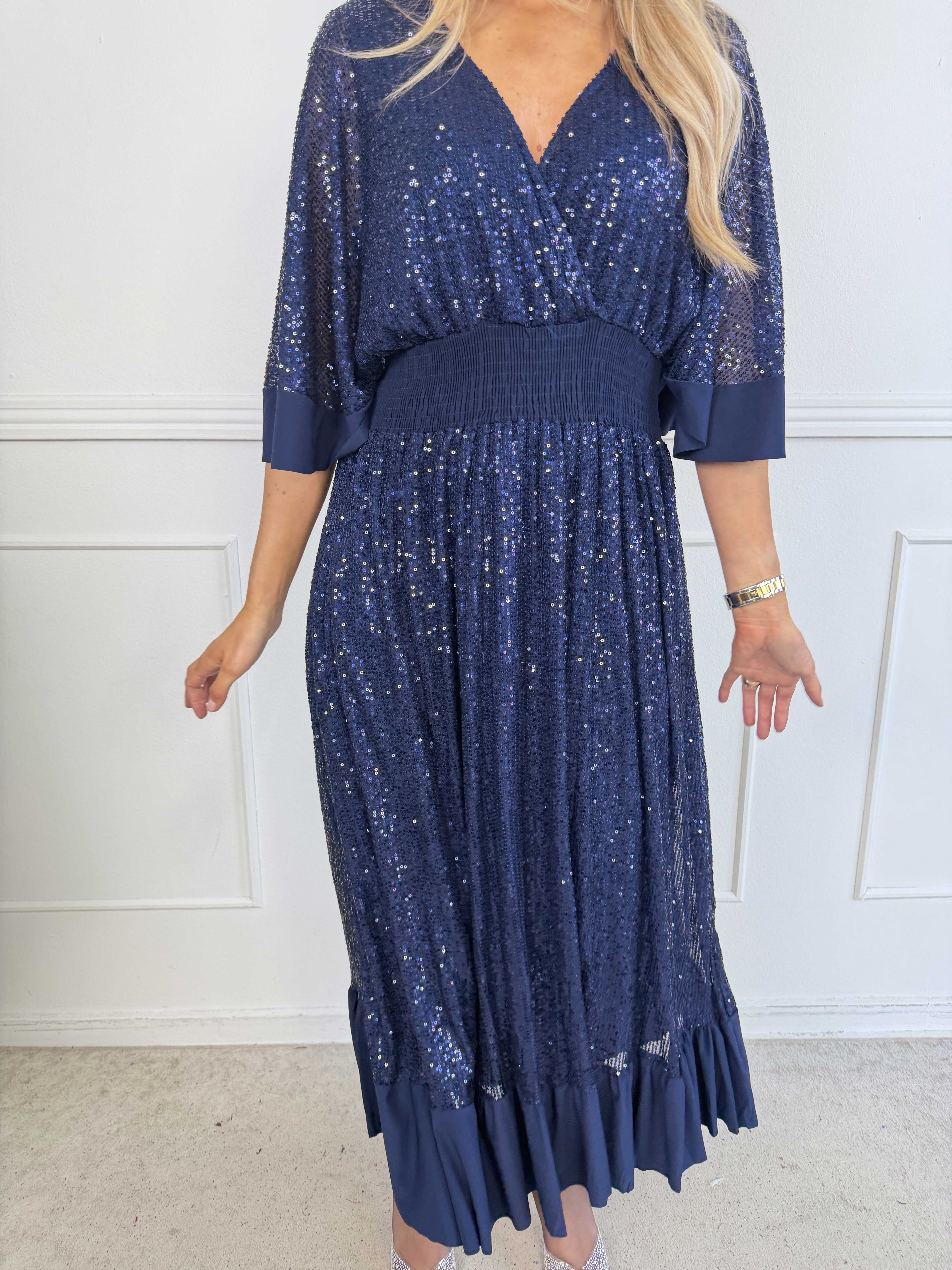 Pamela Glitter - Lång paljettklänning med volanger och smock