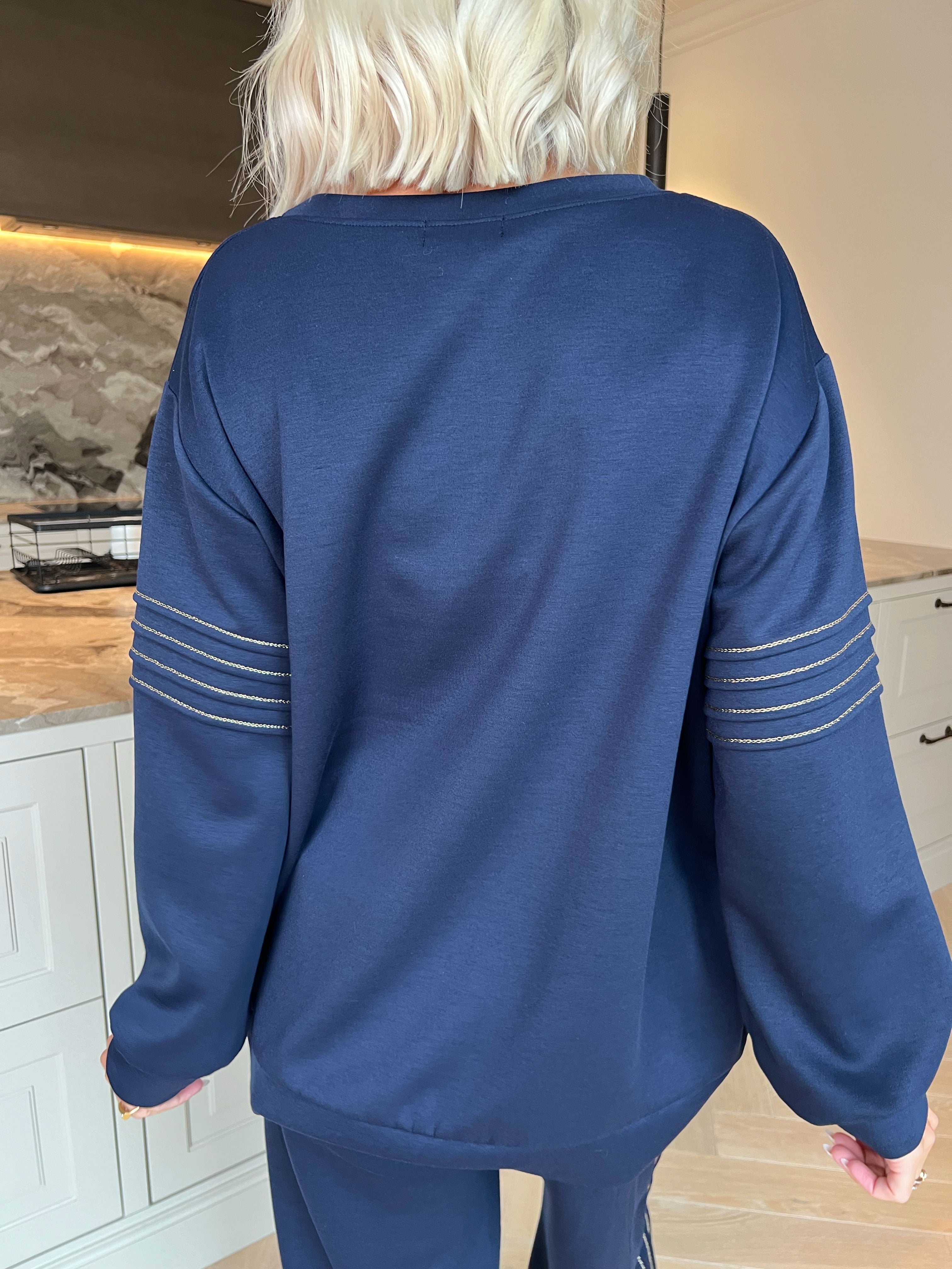 Dream – Mjukt plus size träningsoverallset i viskos med eleganta gulddetaljer