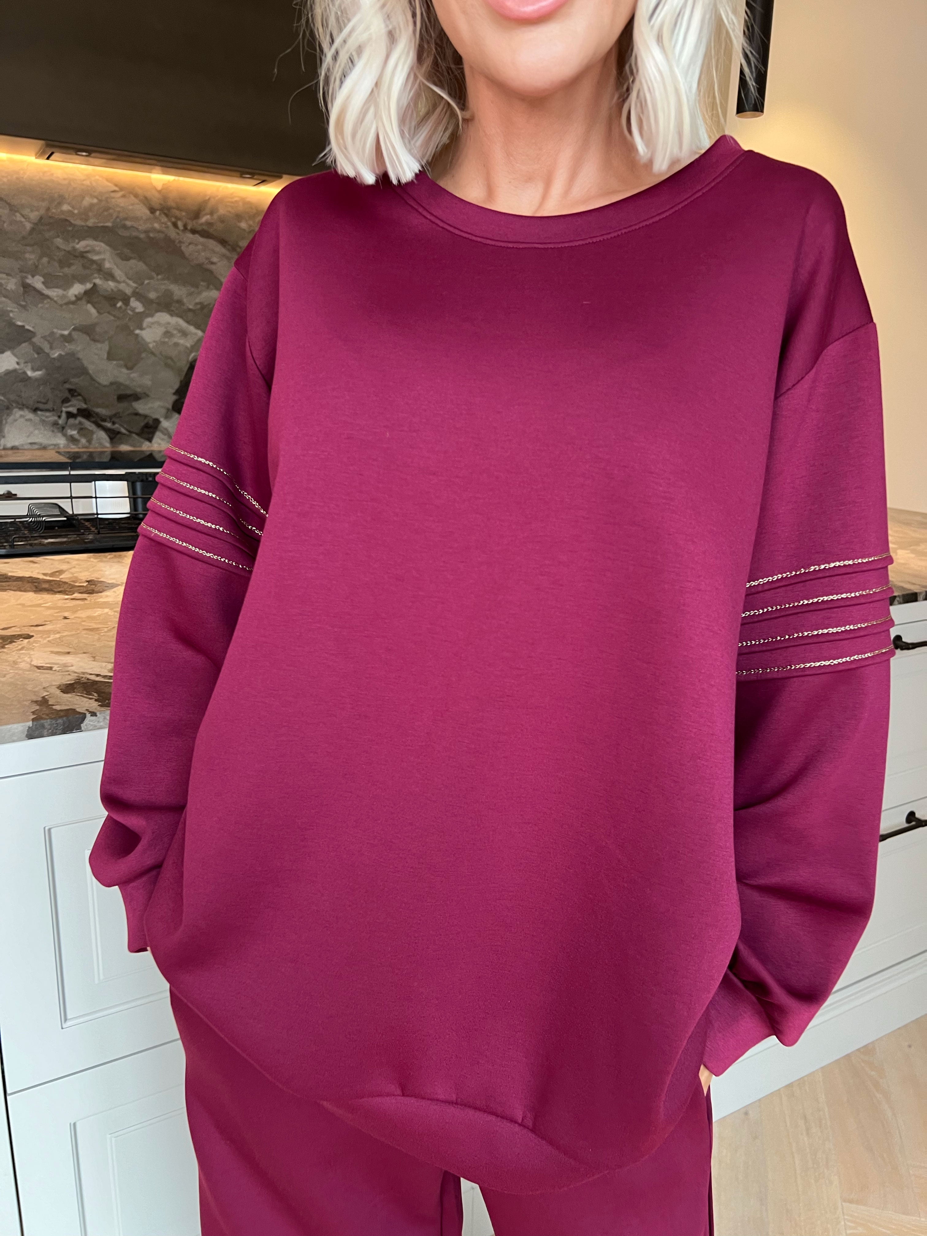 Dream – Mjukt plus size träningsoverallset i viskos med eleganta gulddetaljer