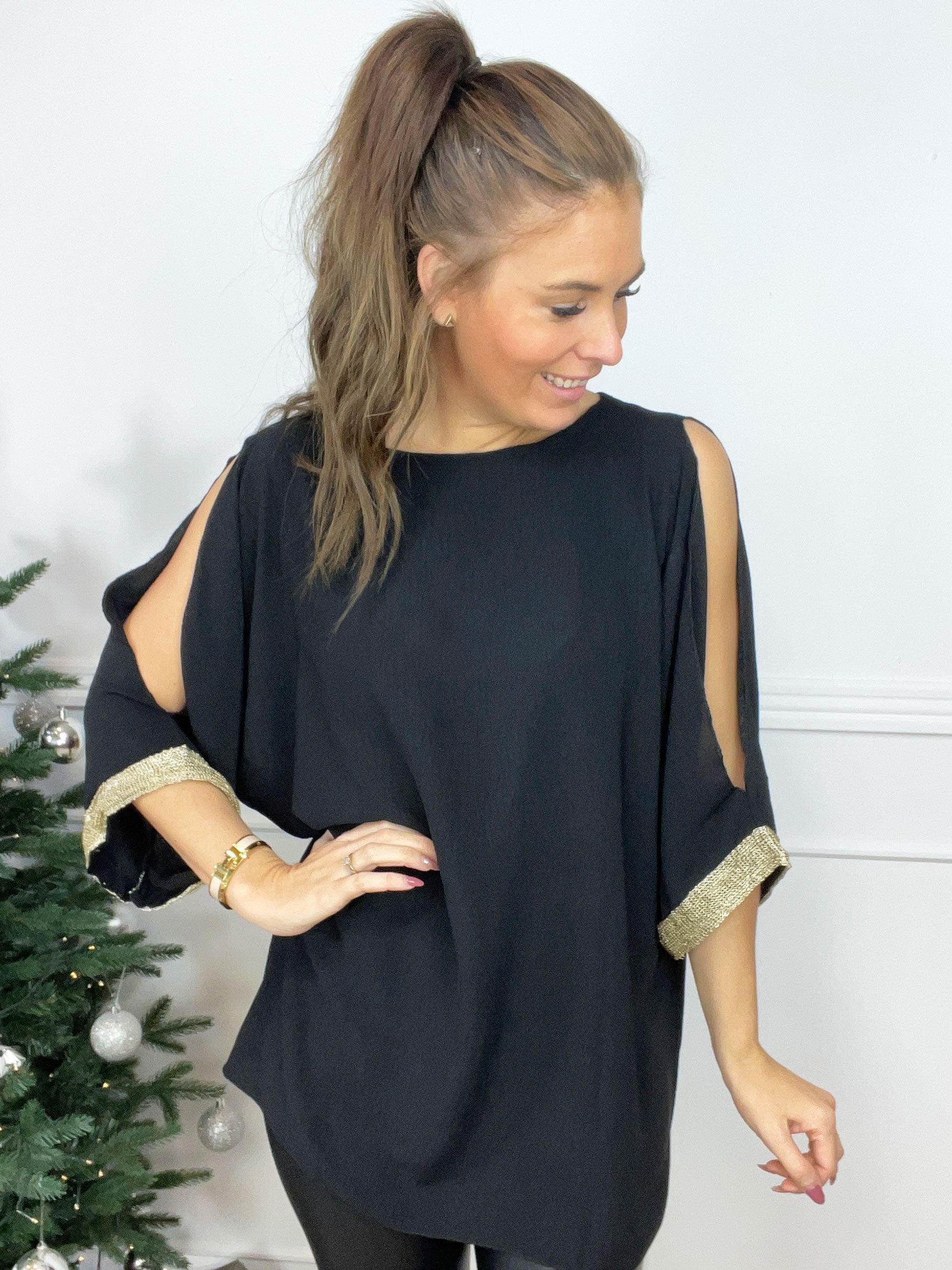 Genova - Enfärgad tunika med glitterkant på ärmen