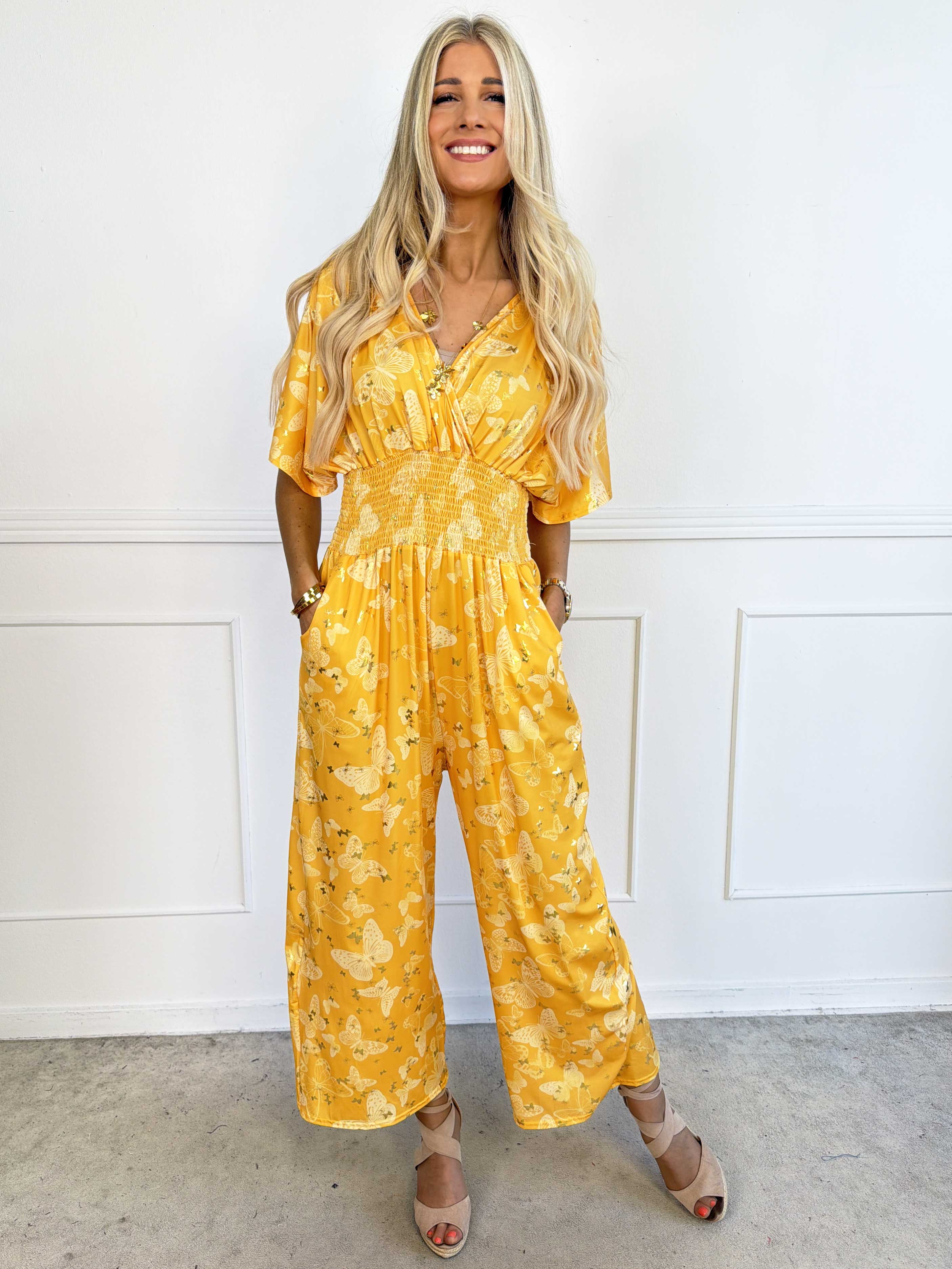 Pams Butterfly Jumpsuit - Elastisk plus size jumpsuit med fjärilsmönster