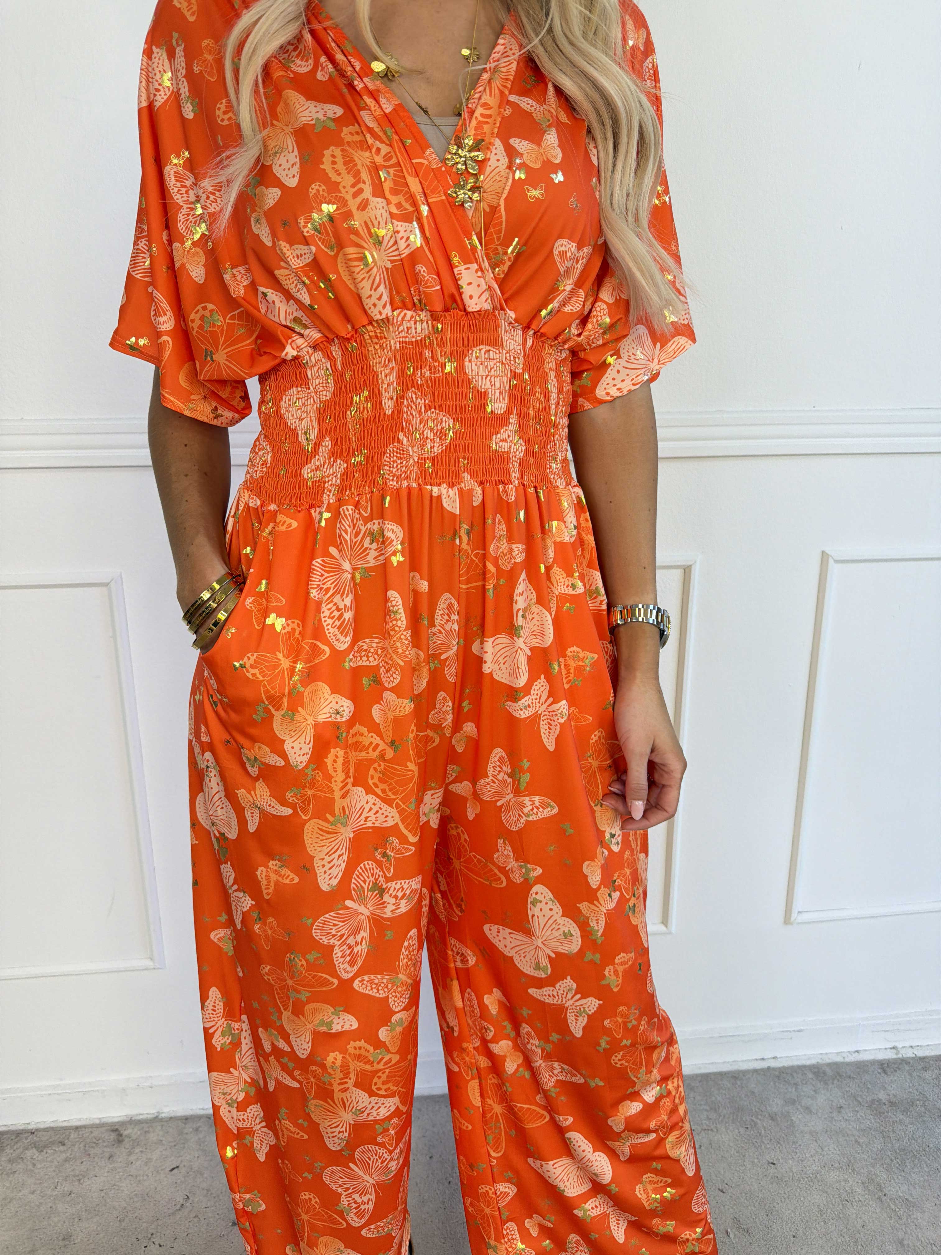 Pams Butterfly Jumpsuit - Elastisk plus size jumpsuit med fjärilsmönster
