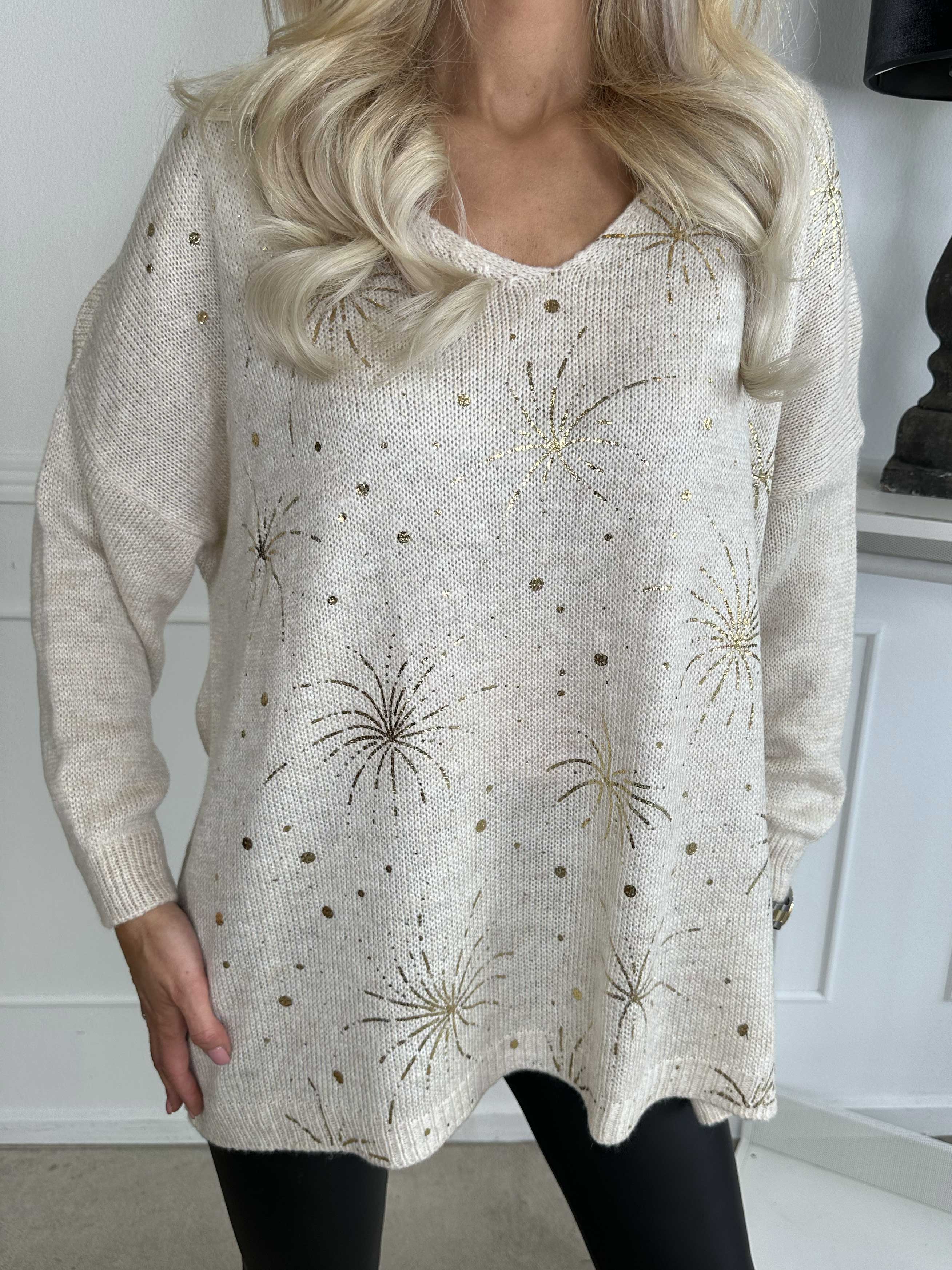 Omaria - Stickad blus med fyrverkerier på