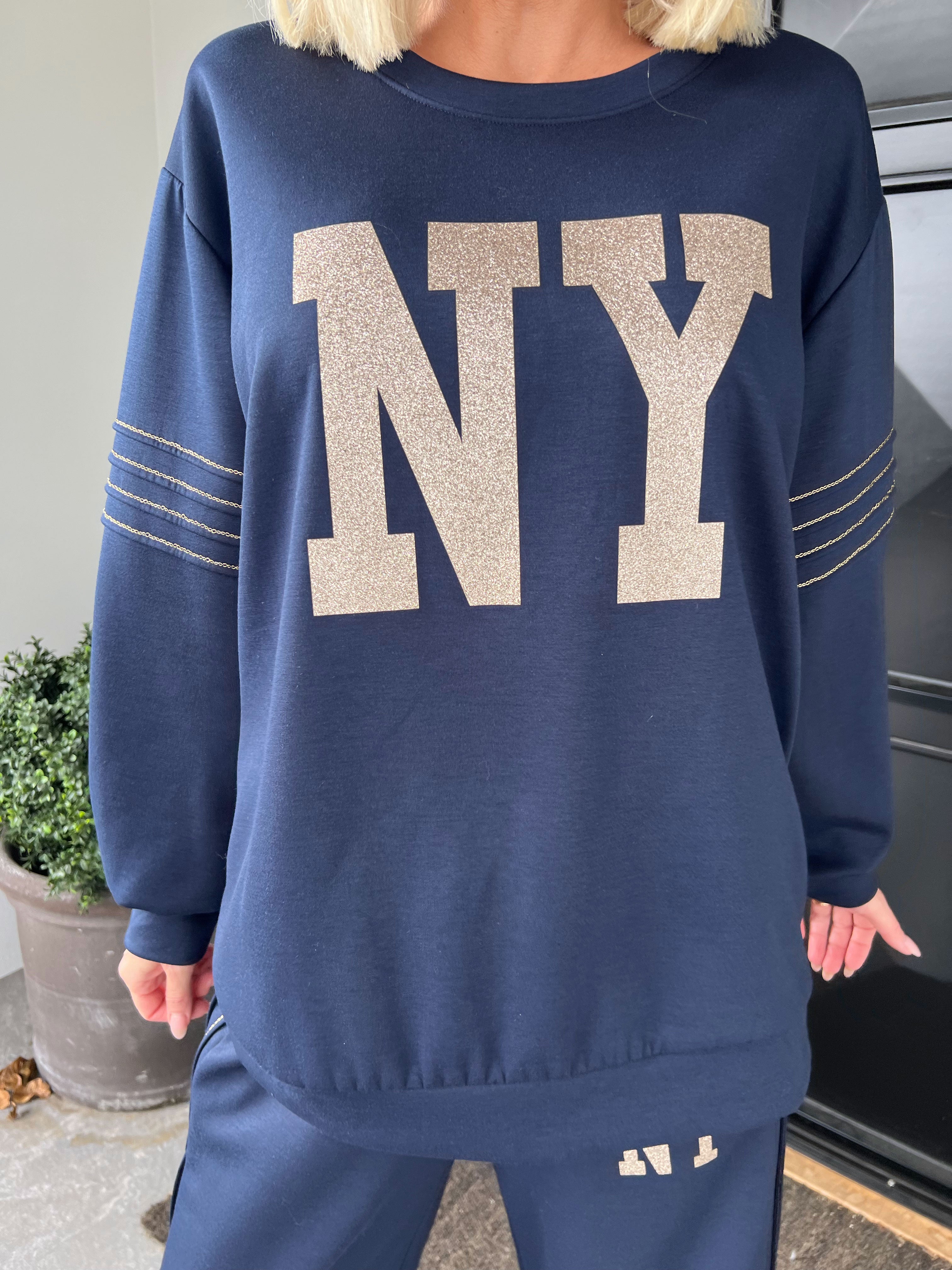 Dream NY – Plus size träningsoverall i viskos med glittrig ”NEW YORK”-text på framsidan