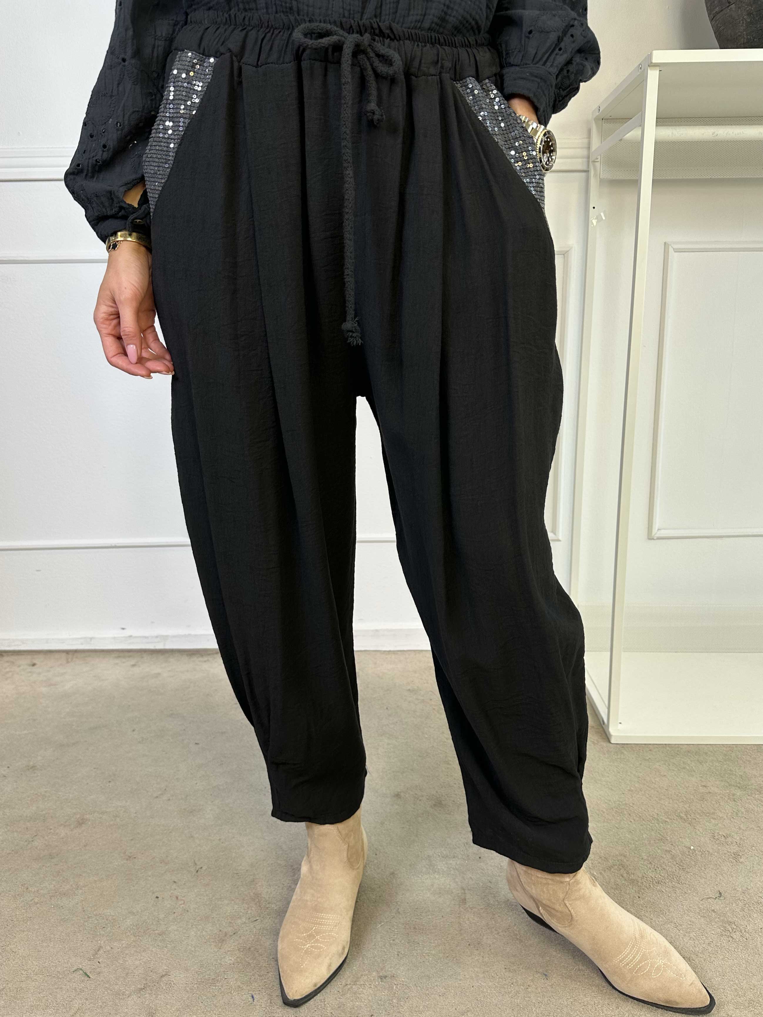 Ines - Byxor i lös viskos med paljetter på fickorna
