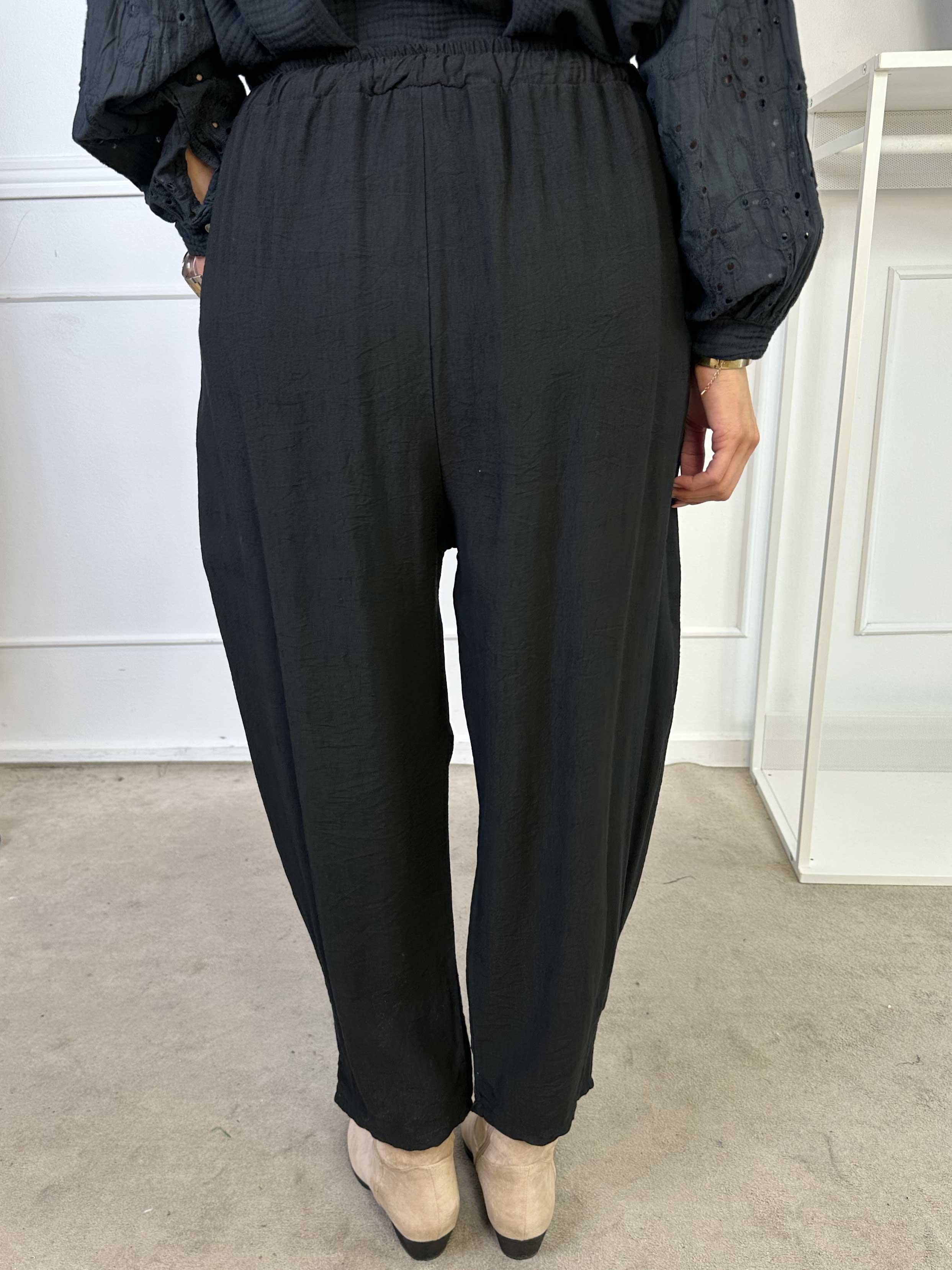 Ines - Byxor i lös viskos med paljetter på fickorna