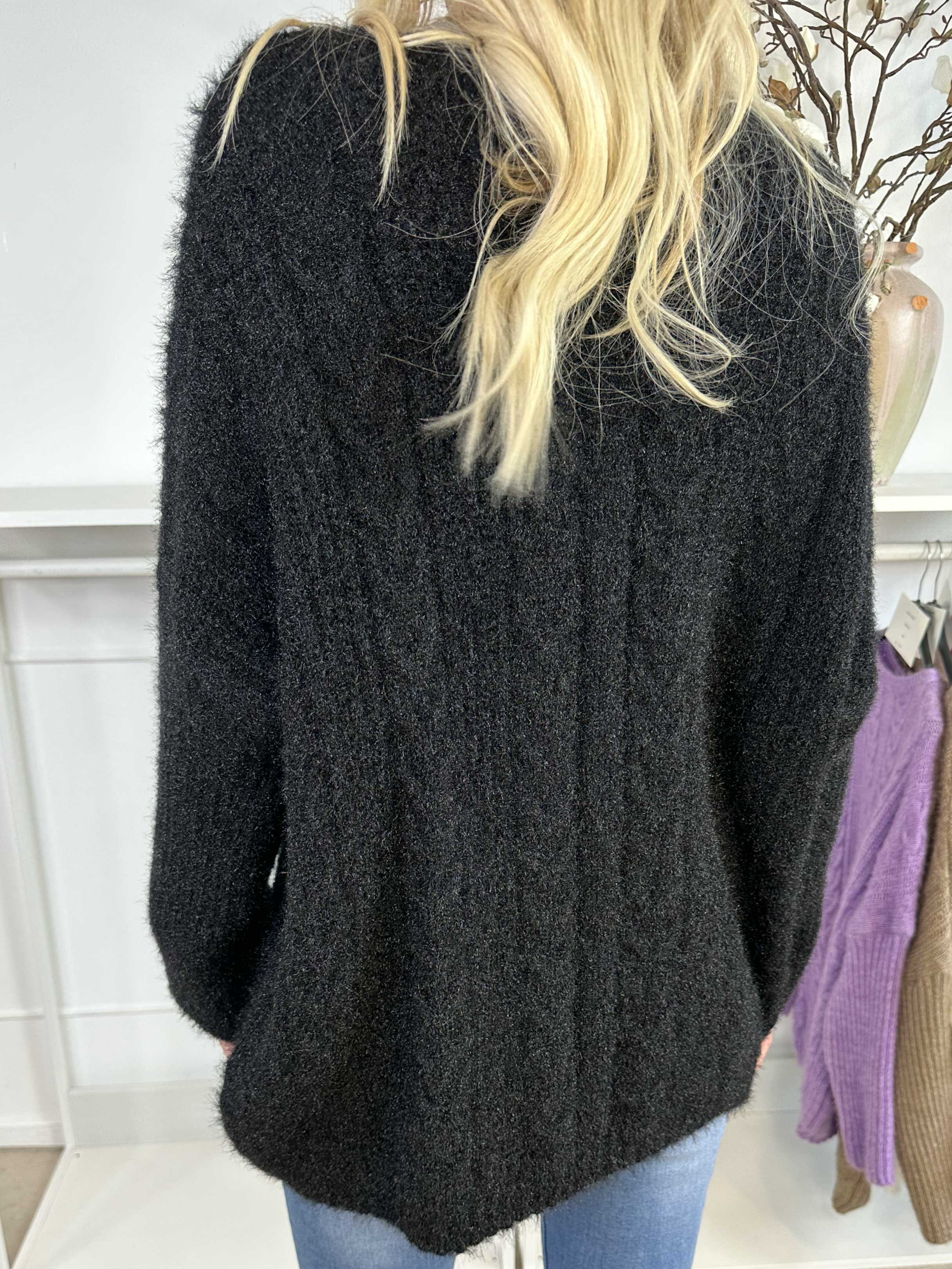 Johanna - Stickad blus i glansig trikå